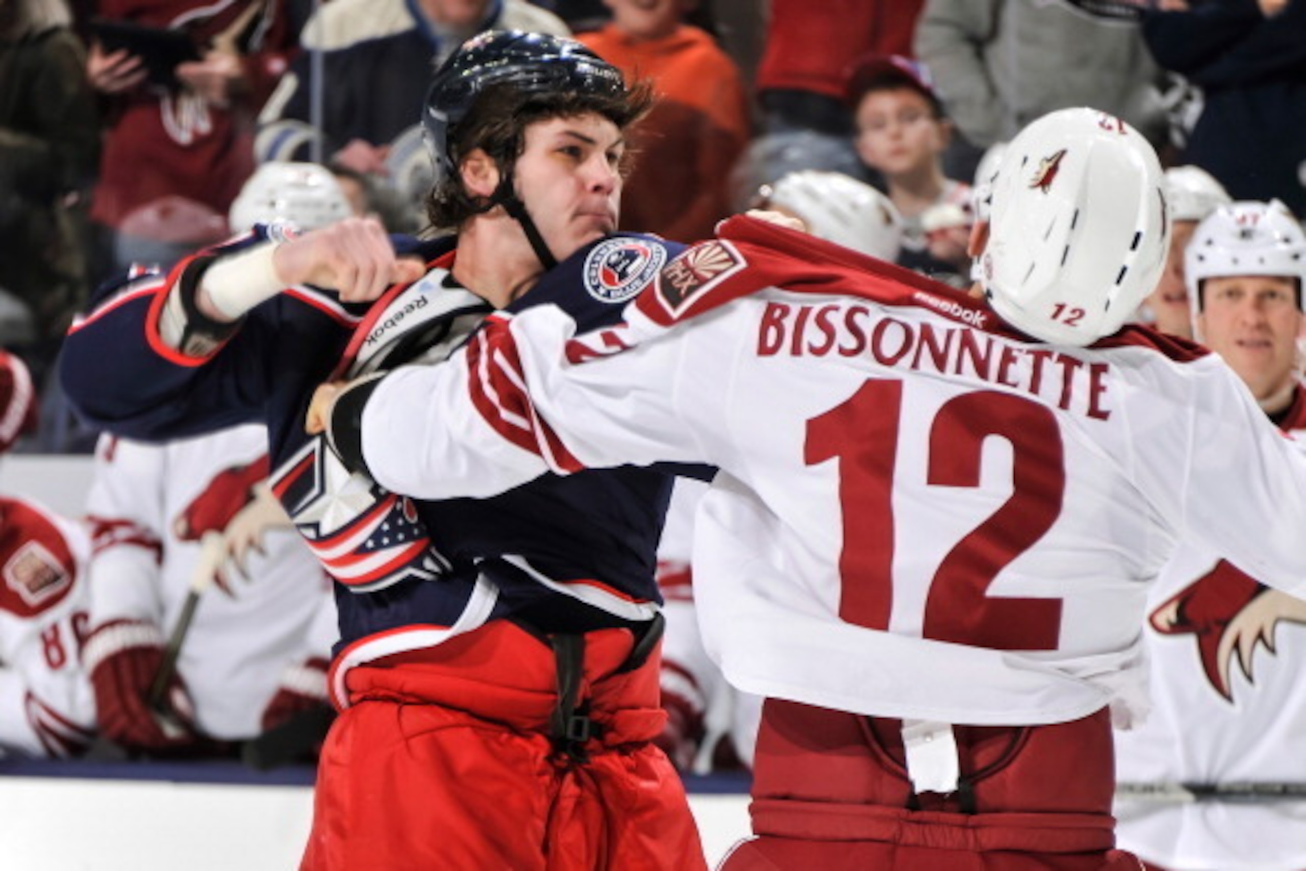 COLUMBUS, OH - MARCH 16:  Jared Boll #40 of the Columbus Blue Jackets fights against Paul Bissonnette #12 of the Phoenix Coyotes on March 16, 2013 at Nationwide Arena in Columbus, Ohio.  (Photo by Jamie Sabau/NHLI via Getty Images)