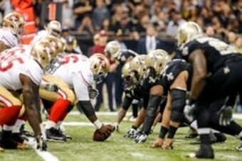 Nov 9, 2014; New Orleans, LA, USA; The San Francisco 49ers lineup against the New Orleans Saints during the first quarter at Mercedes-Benz Superdome. The 49ers won 27-24 in overtime. Mandatory Credit: Derick E. Hingle-USA TODAY Sports