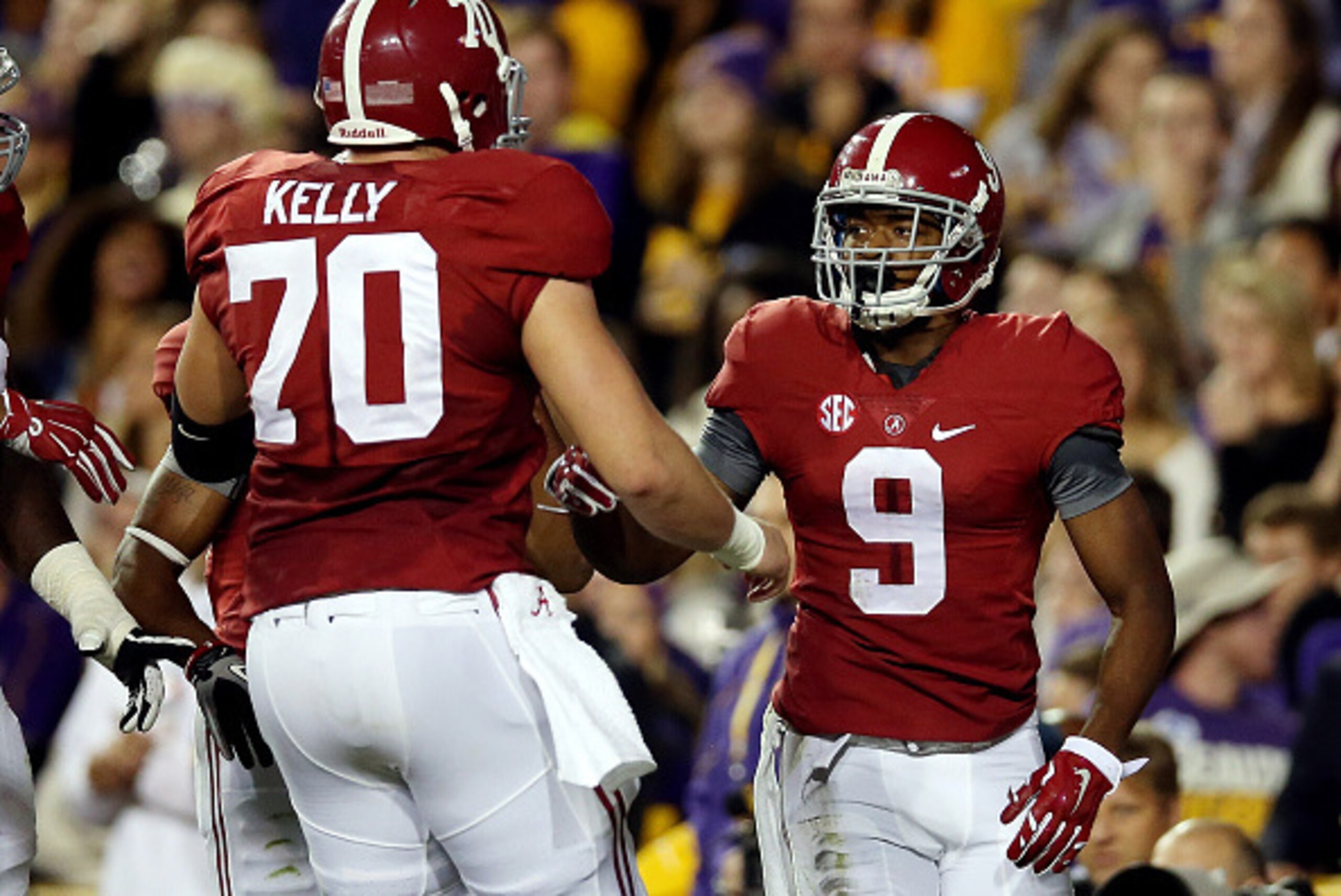 BATON ROUGE, LA - NOVEMBER 08: Amari Cooper #9 celebrates with Ryan Kelly #70 of the Alabama Crimson Tide after a second quarter touchdown against the LSU Tigers during a game at Tiger Stadium on November 8, 2014 in Baton Rouge, Louisiana. (Photo by Chri BATON ROUGE, LA - NOVEMBER 08: Amari Cooper #9 celebrates with Ryan Kelly #70 of the Alabama Crimson Tide after a second quarter touchdown against the LSU Tigers during a game at Tiger Stadium on November 8, 2014 in Baton Rouge, Louisiana. (Photo by Chri