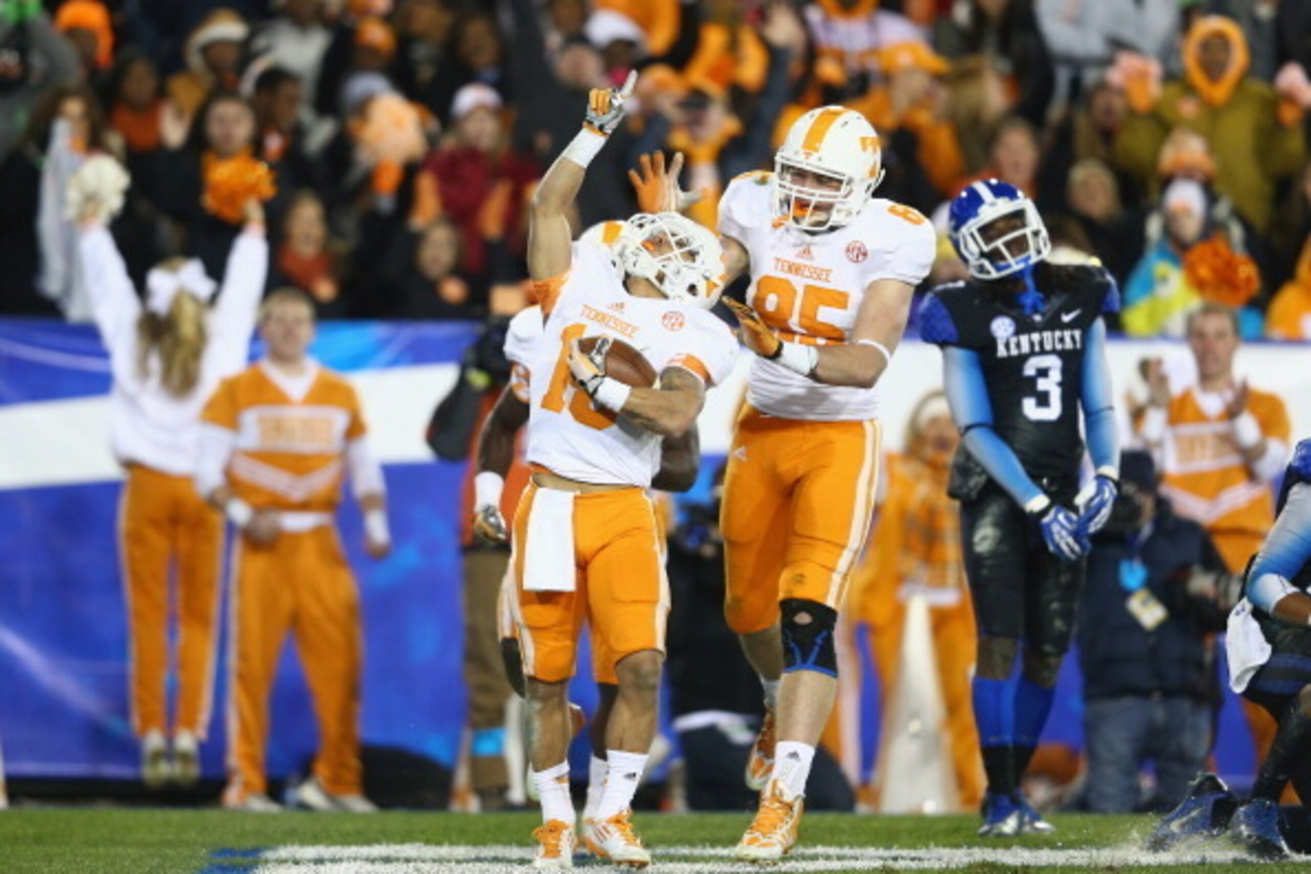 LEXINGTON, KY - NOVEMBER 30:  Devrin Young #19 of the Tennessee Volunteers celebrates after catching a touchdown during the game against the Kentucky Wildcats at Commonwealth Stadium on November 30, 2013 in Lexington, Kentucky.  (Photo by Andy Lyons/Getty