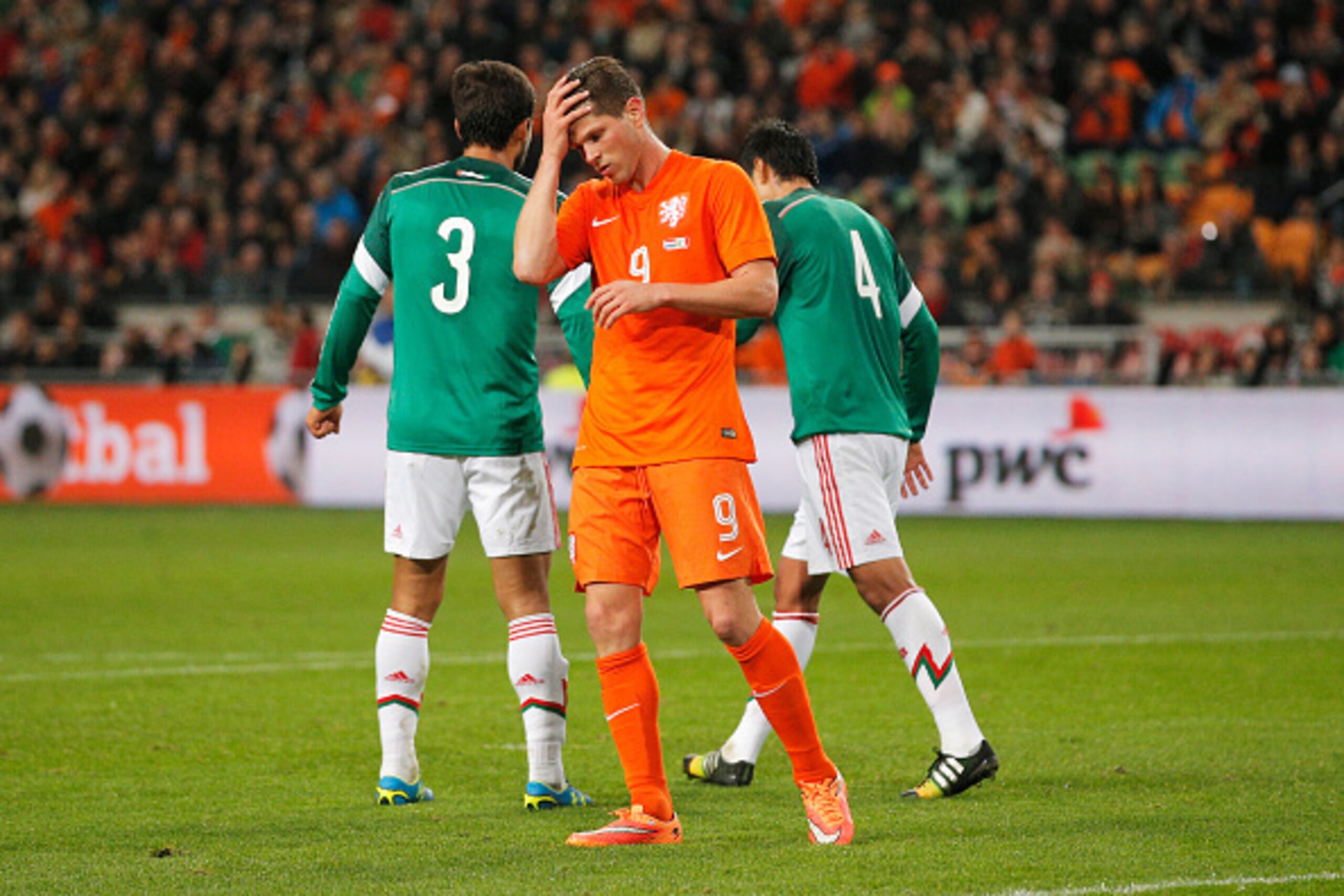 AMSTERDAM, NETHERLANDS - NOVEMBER 12:  Klaas Jan Huntelaar of Netherlands holds his head after a missed chance on goal during the international friendly match between Netherlands and Mexico held at the Amsterdam ArenA on November 12, 2014 in Amsterdam, Ne