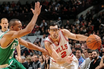 CHICAGO, IL - NOVEMBER 8: Kirk Hinrich #12 of the Chicago Bulls handles the ball against the Boston Celtics on November 08, 2014 at the United Center in Chicago, Illinois. NOTE TO USER: User expressly acknowledges and agrees that, by downloading and or us