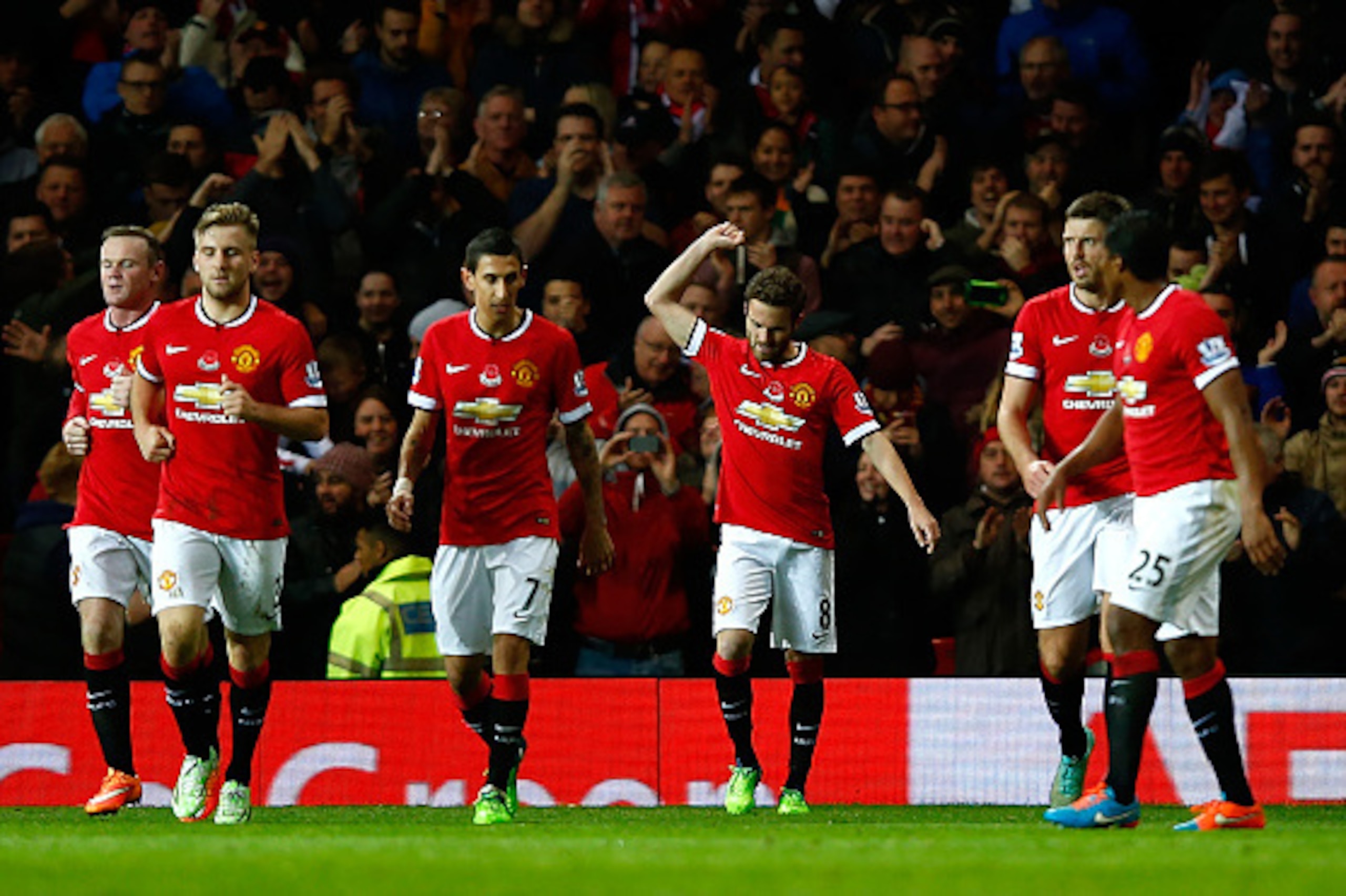MANCHESTER, ENGLAND - NOVEMBER 08:  Juan Mata of Manchester United celebrates scoring the first goal during the Barclays Premier League match between Manchester United and Crystal Palace at Old Trafford on November 8, 2014 in Manchester, England.  (Photo 
