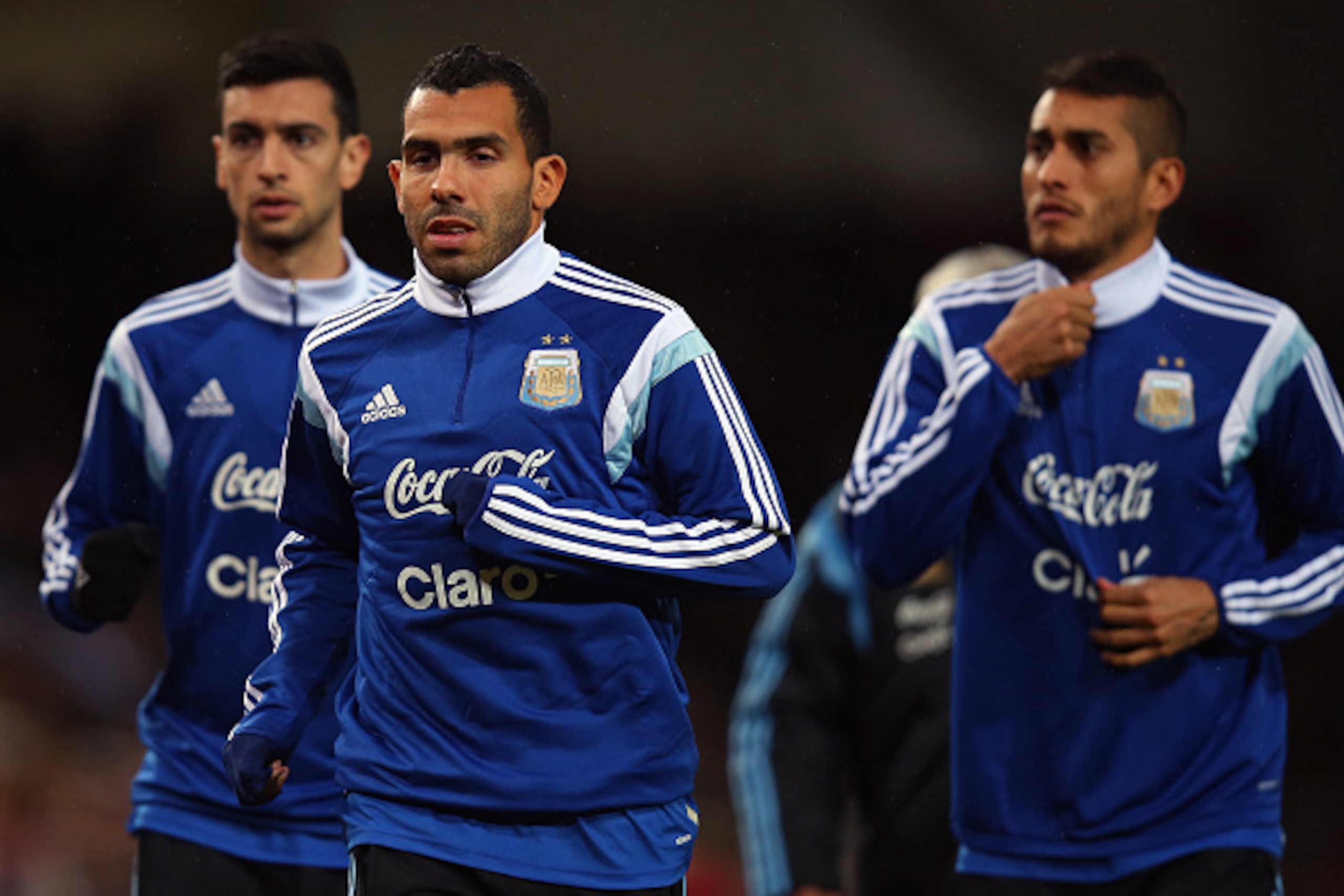 LONDON, ENGLAND - NOVEMBER 12:  Carlos Tevez of Argentina warms up prior to playing in the second half of the International Friendly between Argentina and Croatia at Boleyn Ground on November 12, 2014 in London, England.  (Photo by Bryn Lennon/Getty Image