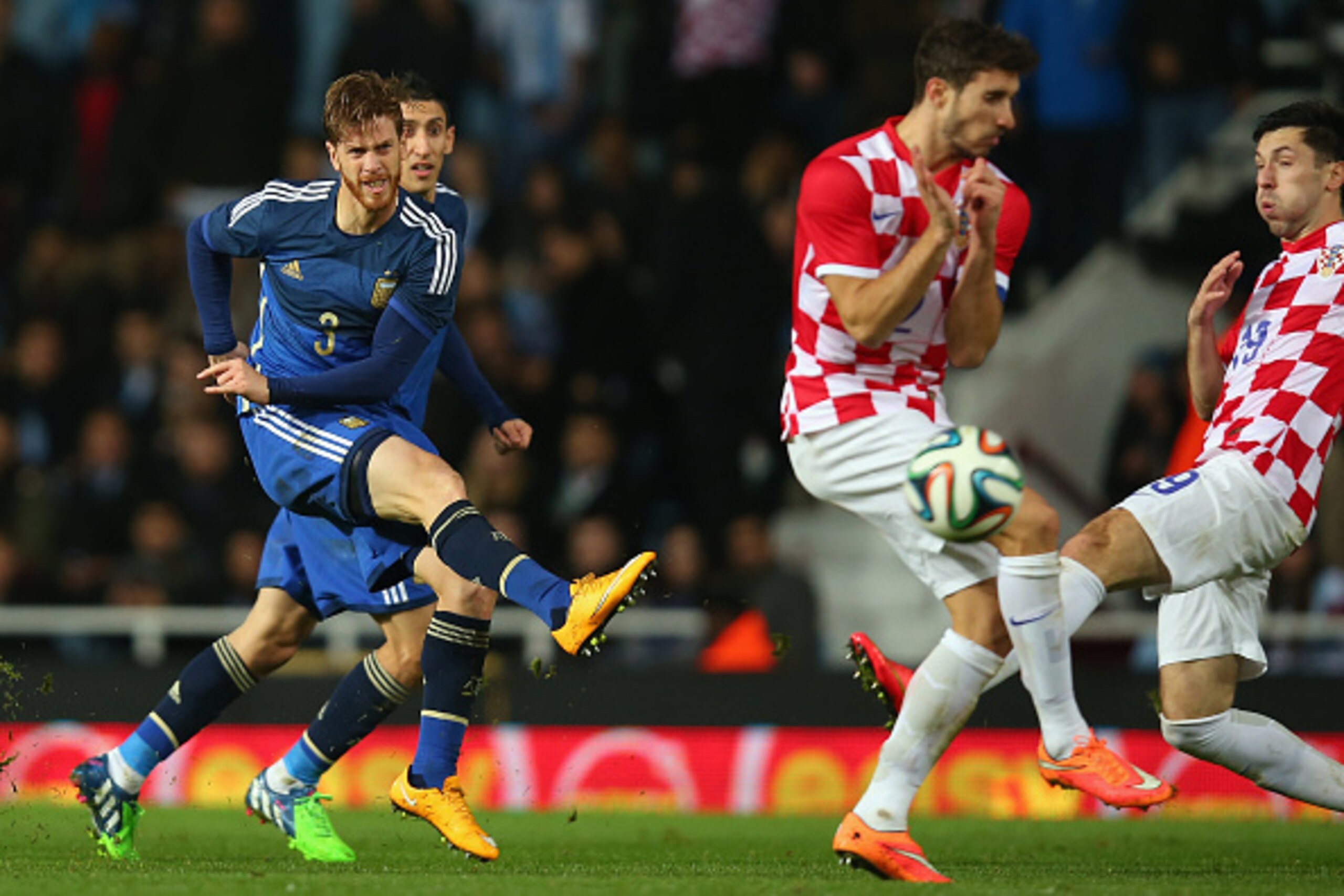 LONDON, ENGLAND - NOVEMBER 12:  Christian  Ansaldi of Argentina scores during the International Friendly between Argentina and Croatia at Boleyn Ground on November 12, 2014 in London, England.  (Photo by Bryn Lennon/Getty Images)