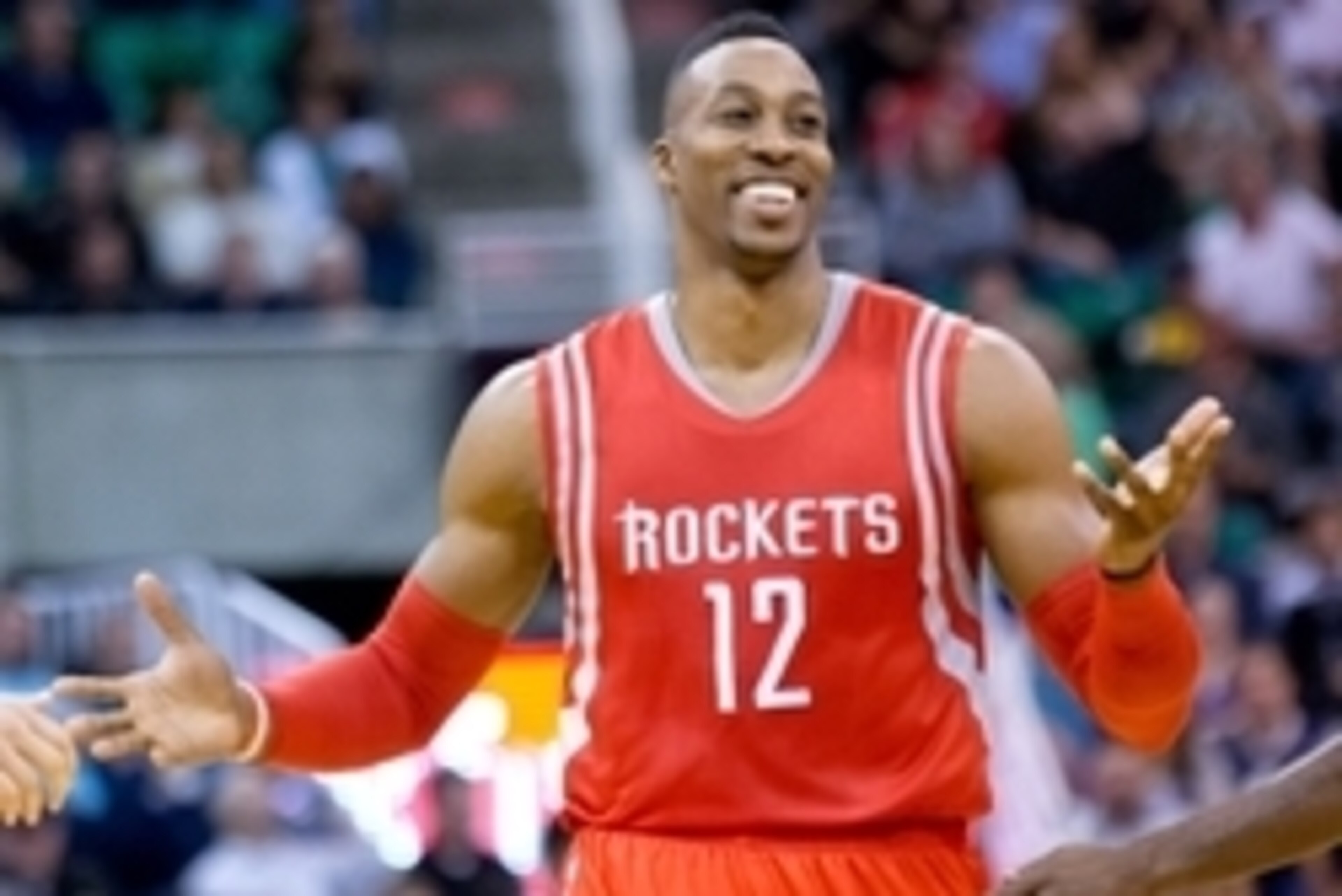 Oct 29, 2014; Salt Lake City, UT, USA; Houston Rockets center Dwight Howard (12) reacts during the second half against the Utah Jazz at EnergySolutions Arena. The Rockets won 104-93. Mandatory Credit: Russ Isabella-USA TODAY Sports