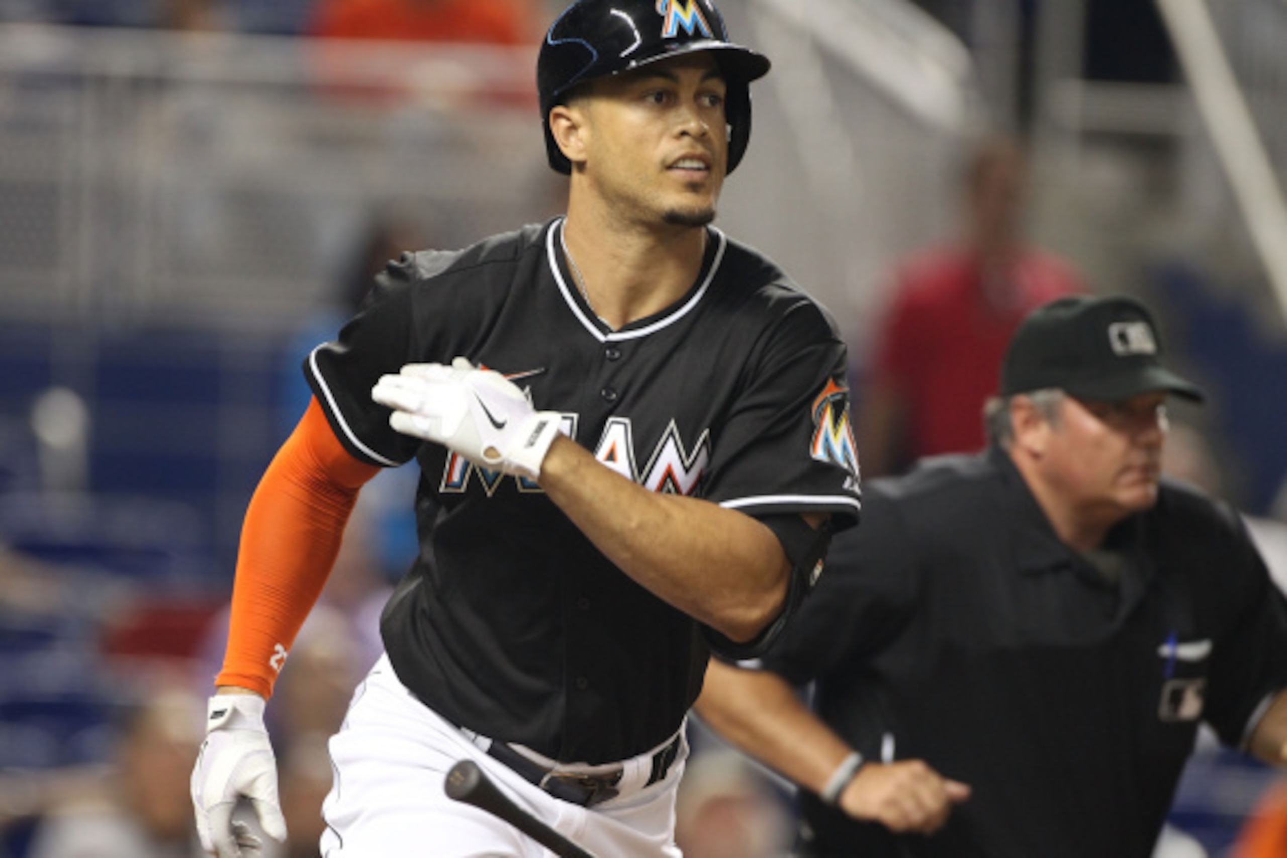 MIAMI, FL - SEPTEMBER 06: Giancarlo Stanton #27 of the Miami Marlinsflies out against the Atanta Braves during the first inning at Marlins Park on September 6, 2014 in Miami, Florida.  (Photo by Marc Serota/Getty Images)