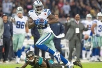 Nov 9, 2014; London, UNITED KINGDOM; Dallas Cowboys wide receiver Dez Bryant (88) catches a touchdown pass and runs into the end zone during the first half of the game Dallas Cowboys and the Jacksonville Jaguars at Wembley Stadium Mandatory Credit: Steve 
