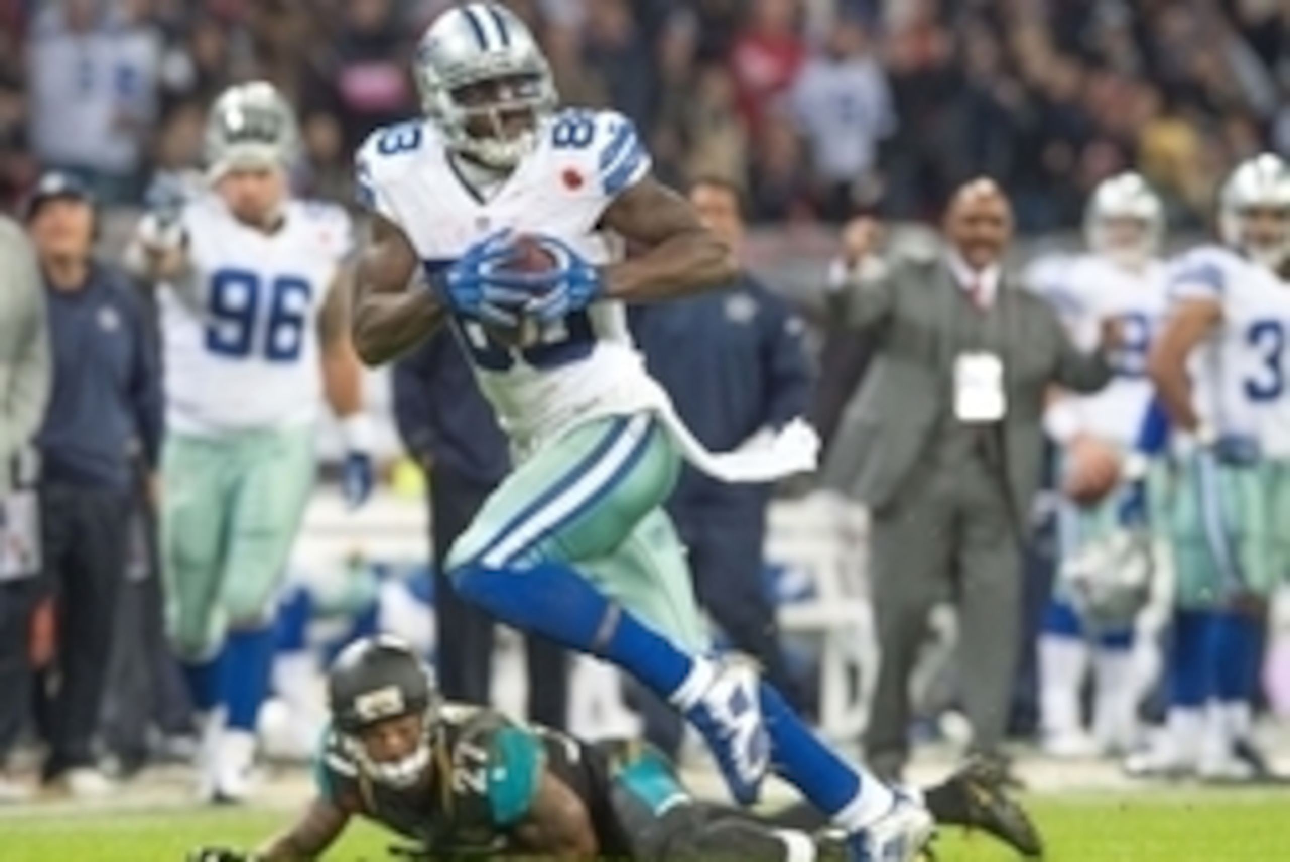 Nov 9, 2014; London, UNITED KINGDOM; Dallas Cowboys wide receiver Dez Bryant (88) catches a touchdown pass and runs into the end zone during the first half of the game Dallas Cowboys and the Jacksonville Jaguars at Wembley Stadium Mandatory Credit: Steve 