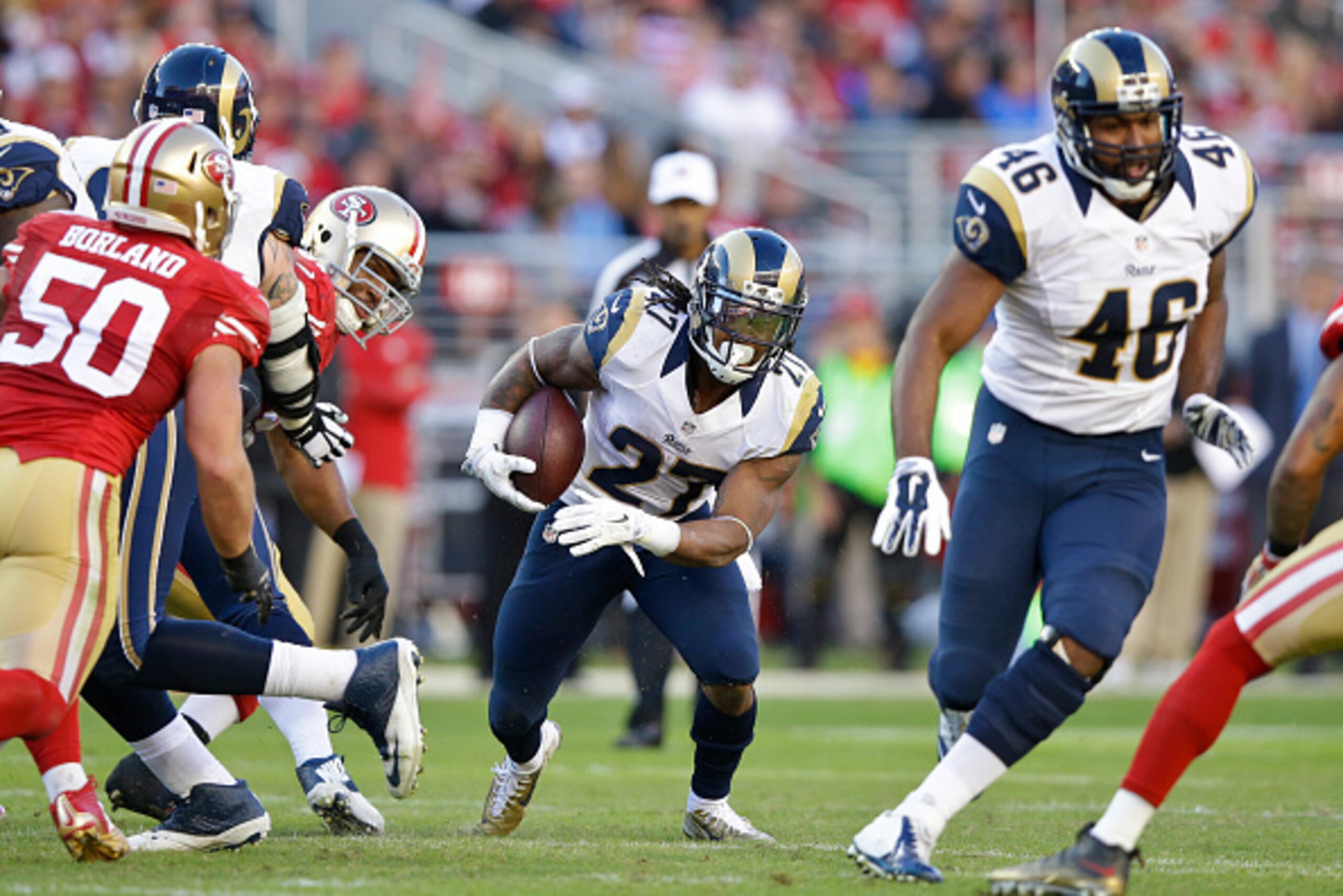 SANTA CLARA, CA - NOVEMBER 02: Tre Mason #27 of the St. Louis Rams rushes up field against the San Francisco 49ers during the fourth quarter at Levi's Stadium on November 2, 2014 in Santa Clara, California.  (Photo by Ezra Shaw/Getty Images)