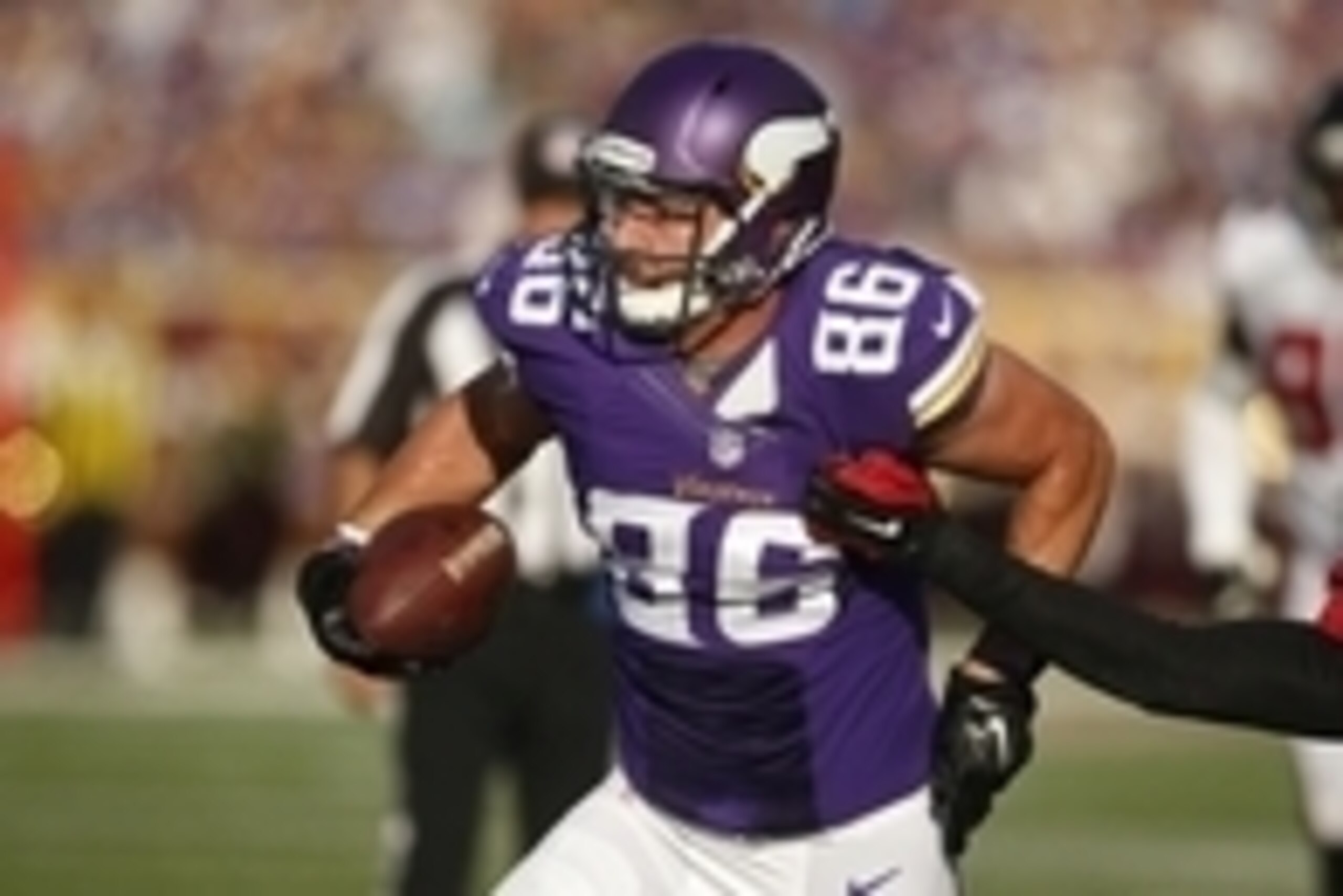 Sep 28, 2014; Minneapolis, MN, USA; Minnesota Vikings tight end Chase Ford (86) catches a pass against Atlanta Falcons defensive back Kemal Ishmael (36) in the second quarter at TCF Bank Stadium. The Vikings win 41-28. Mandatory Credit: Bruce Kluckhohn-US