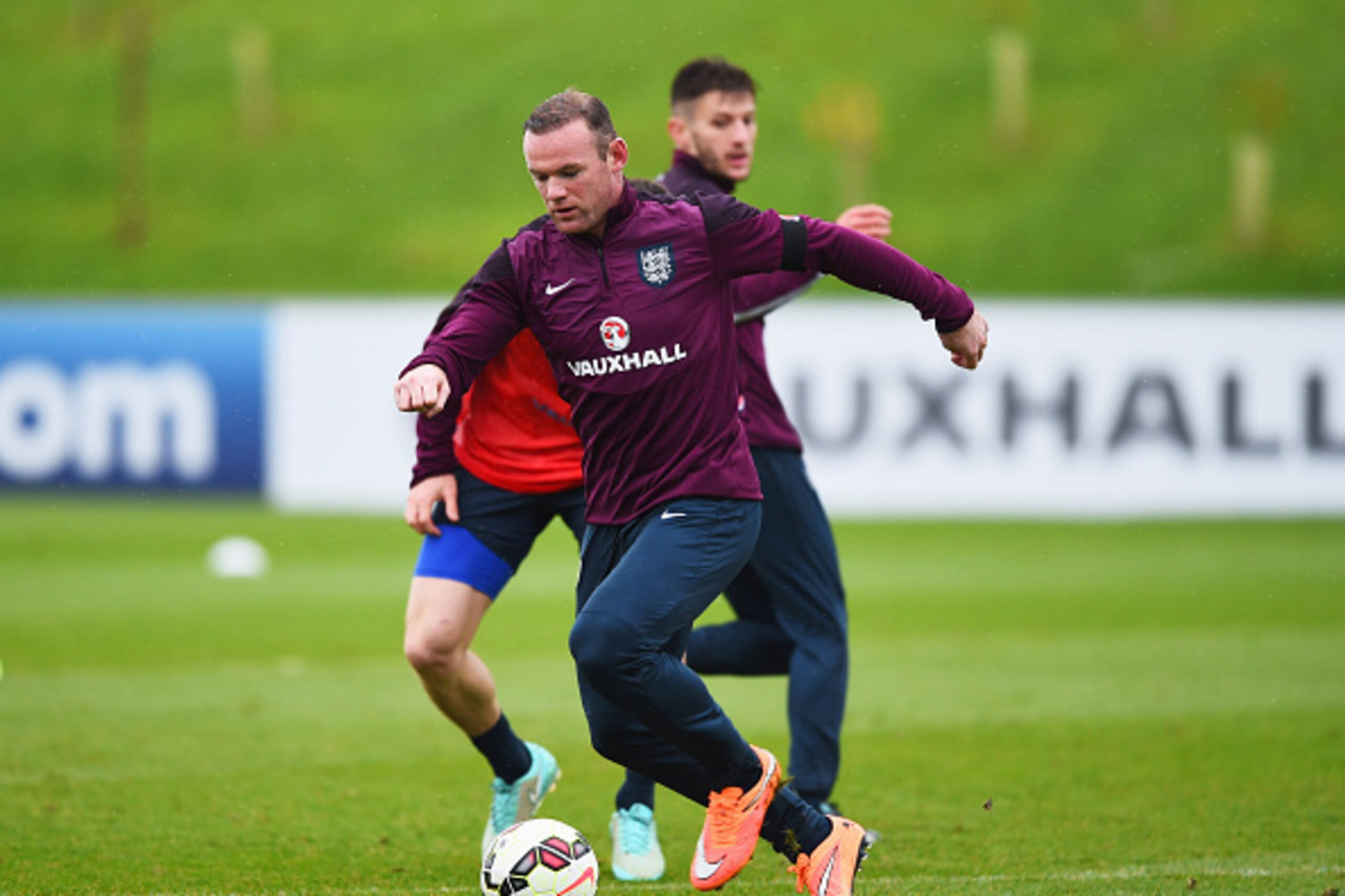 BURTON-UPON-TRENT, ENGLAND - NOVEMBER 11:  Wayne Rooney in action during an England training session, ahead of the UEFA European Championship qualifier against Slovenia, at St Georges Park on November 11, 2014 in Burton-upon-Trent, England.  (Photo by Sha