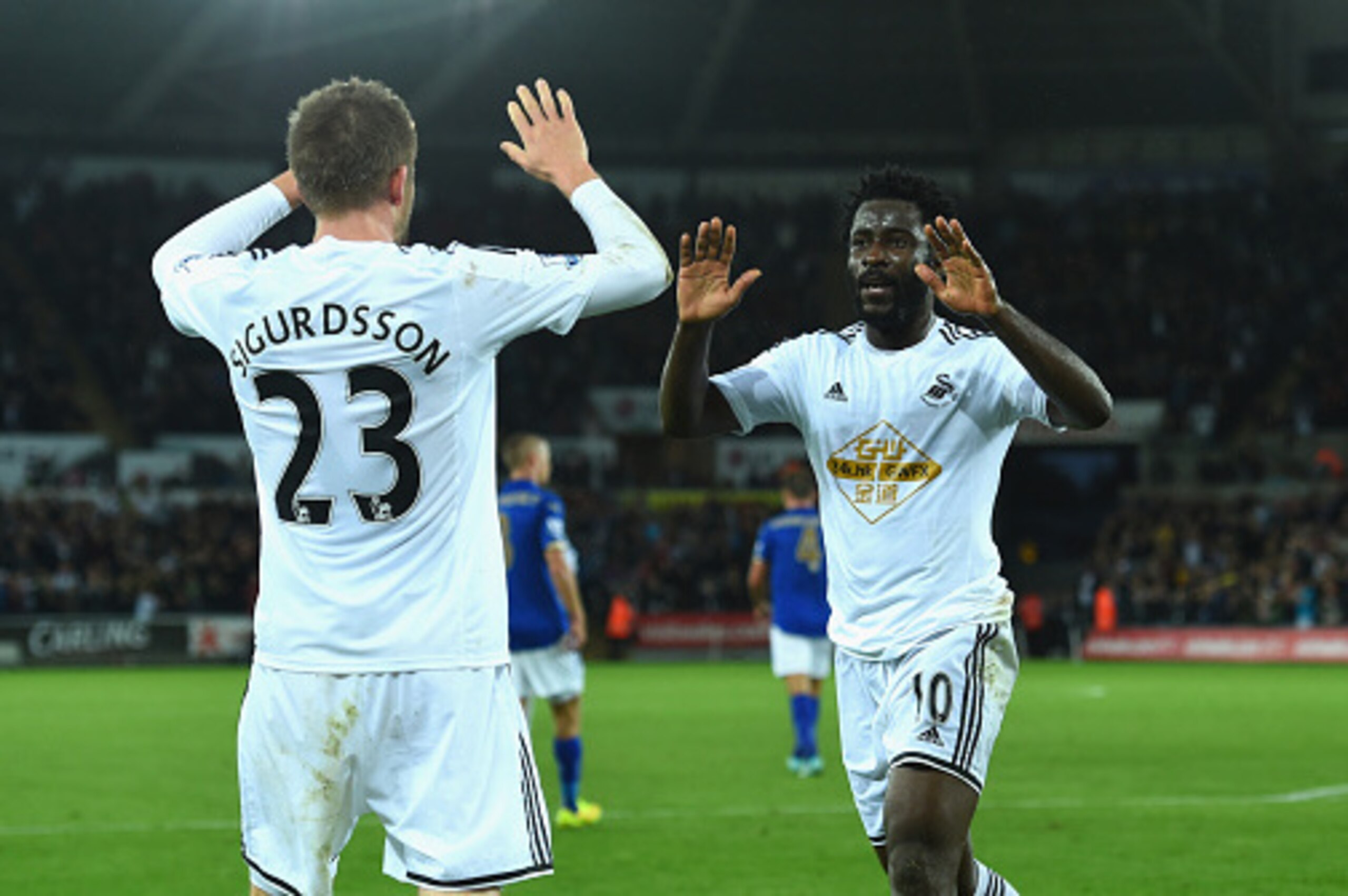 SWANSEA, WALES - OCTOBER 25:  Wilfried Bony of Swansea celebrates after scoring the opening goal during the Barclays Premier League match between Swansea City and Leicester City at Liberty Stadium on October 25, 2014 in Swansea, Wales.  (Photo by Stu Fors