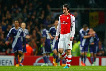 LONDON, ENGLAND - NOVEMBER 04:  Despair for Tomas Rosicky of Arsenal (7) as Aleksandar Mitrovic of Anderlecht (not pictured) scores their third goal during the UEFA Champions League Group D match between Arsenal FC and RSC Anderlecht at Emirates Stadium o