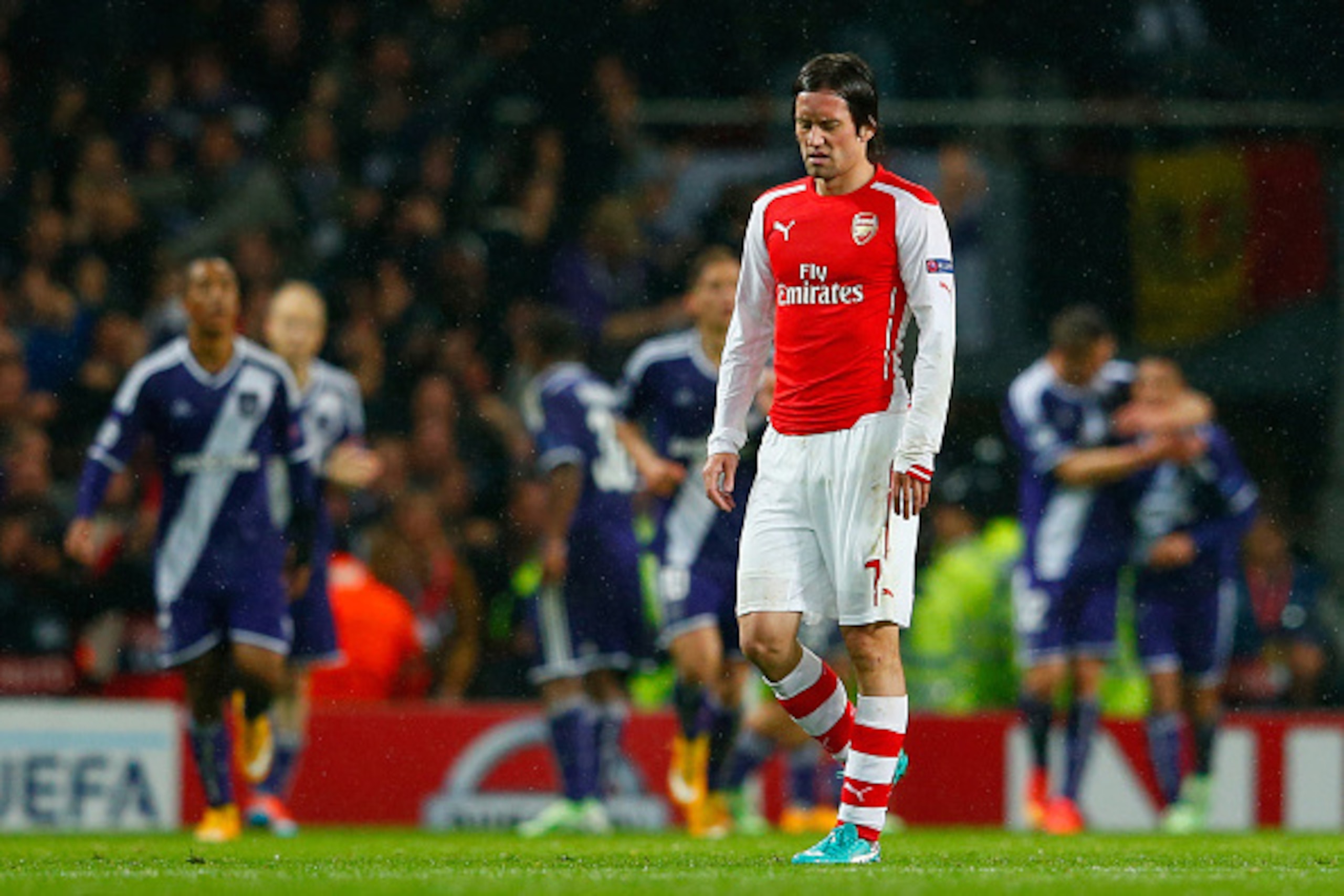 LONDON, ENGLAND - NOVEMBER 04:  Despair for Tomas Rosicky of Arsenal (7) as Aleksandar Mitrovic of Anderlecht (not pictured) scores their third goal during the UEFA Champions League Group D match between Arsenal FC and RSC Anderlecht at Emirates Stadium o