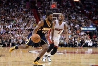 Nov 12, 2014; Miami, FL, USA; Indiana Pacers forward Solomon Hill (44) drives to the basket as Miami Heat guard Dwyane Wade (3) defends the play during the second half at American Airlines Arena. The Pacers won 81-75. Mandatory Credit: Steve Mitchell-USA