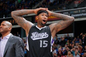 SACRAMENTO, CA - OCTOBER 31: DeMarcus Cousins #15 of the Sacramento Kings reacts against the Portland Trail Blazers on October 31, 2014 at Sleep Train Arena in Sacramento, California. NOTE TO USER: User expressly acknowledges and agrees that, by downloadi