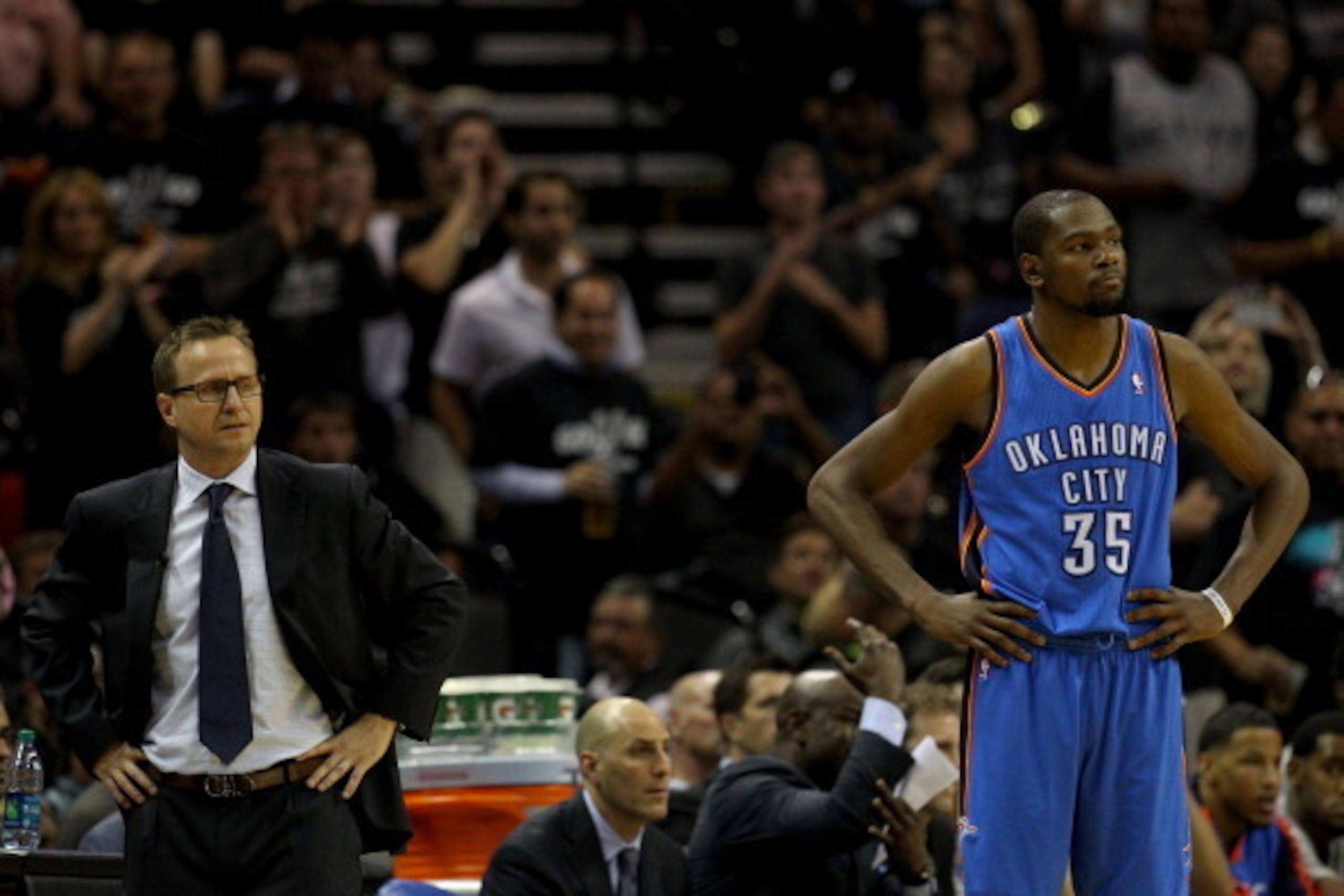 SAN ANTONIO, TX - MAY 19:  Kevin Durant #35 of the Oklahoma City Thunder reacts alongside head coach Scott Brooks after Durant is given a technical foul against the San Antonio Spurs in Game One of the Western Conference Finals during the 2014 NBA Playoff