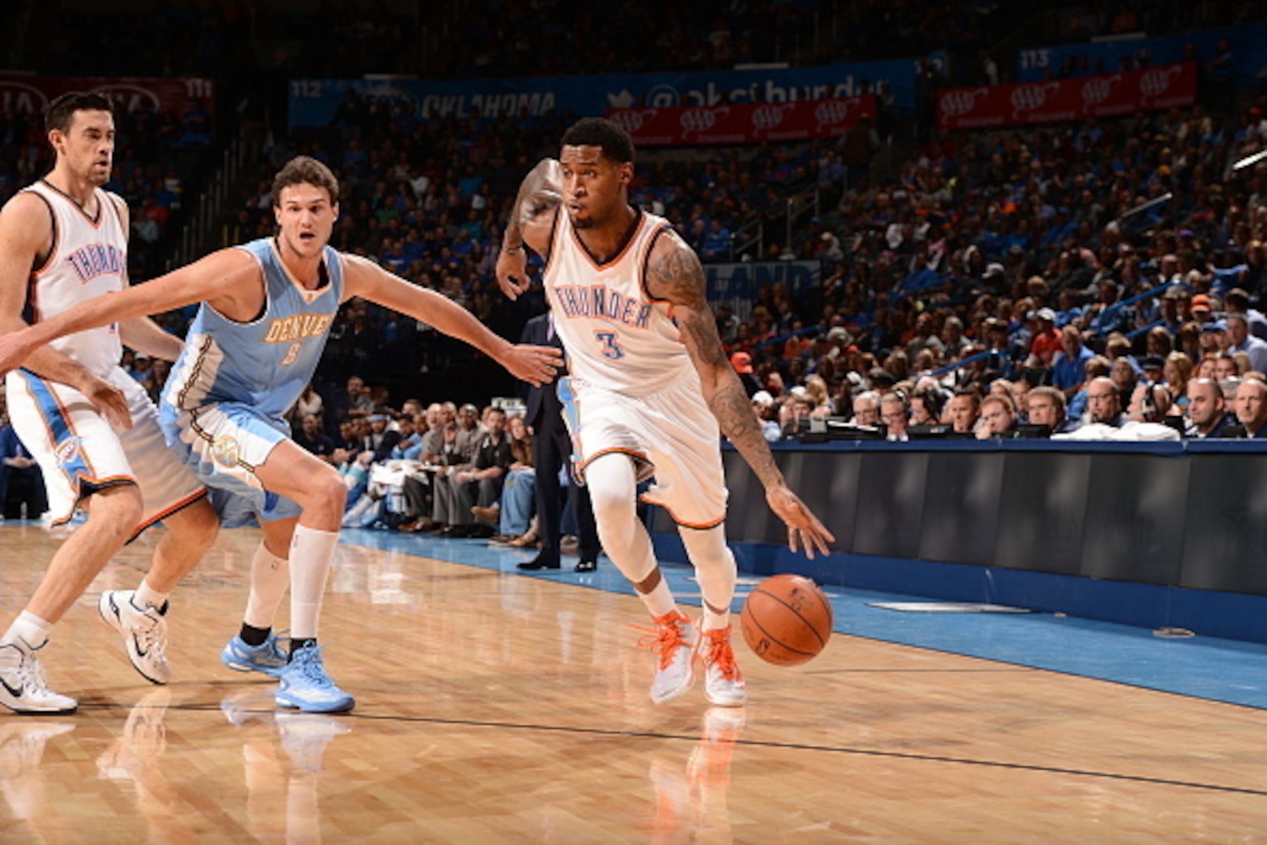 OKLAHOMA CITY, OK - NOVEMBER 1: Perry Jones #3 of the Oklahoma City Thunder handles the ball against the Denver Nuggets during the game at the Chesapeake Energy Arena on November 1, 2014 in Oklahoma City, Oklahoma. NOTE TO USER: User expressly acknowledge