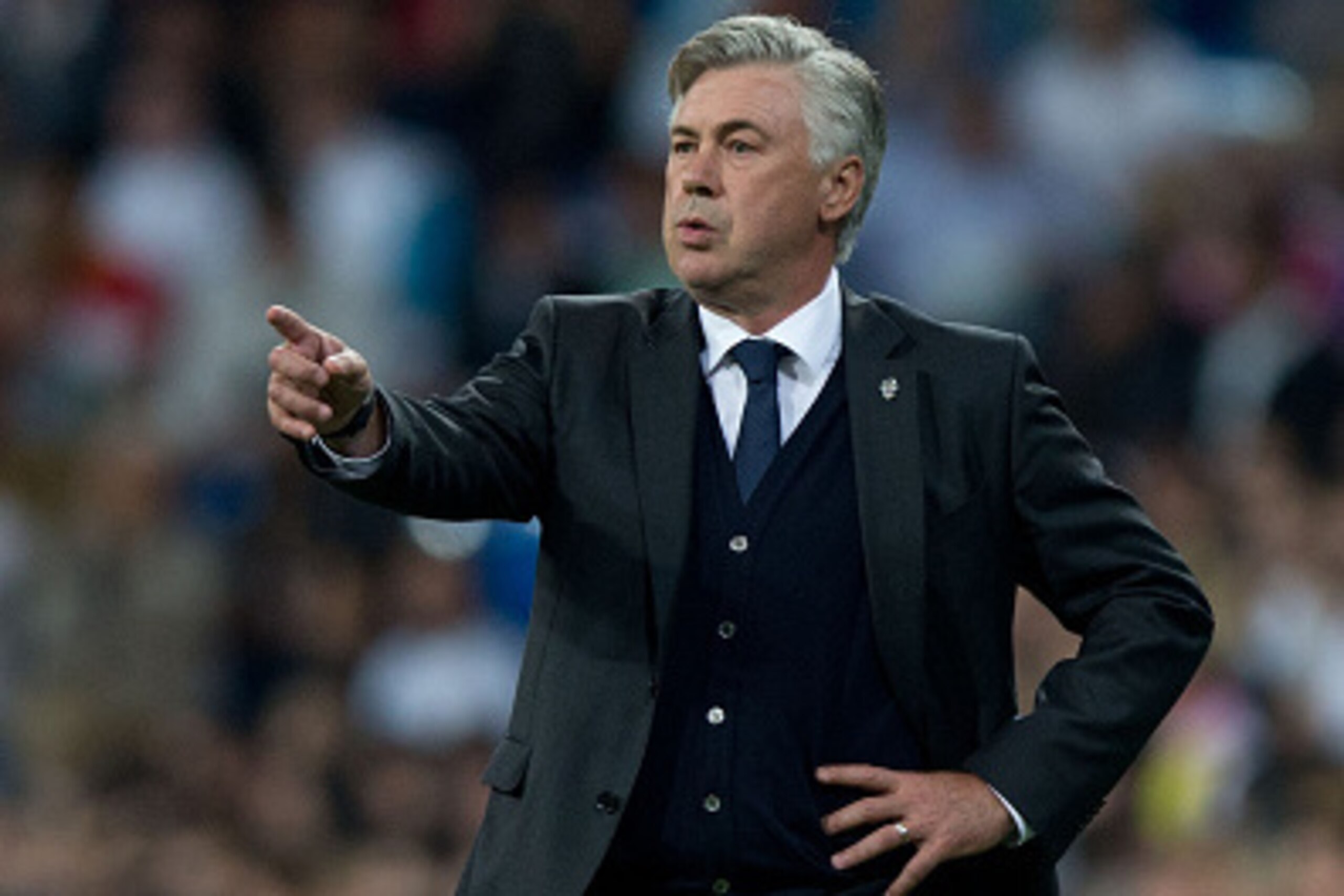 MADRID, SPAIN - SEPTEMBER 23: Head coach Carlo Ancelotti of Real Madrid CF gives instructions during the La Liga match between Real Madrid CF and Elche CF at Estadio Santiago Bernabeu on September 23, 2014 in Madrid, Spain.  (Photo by Gonzalo Arroyo Moren