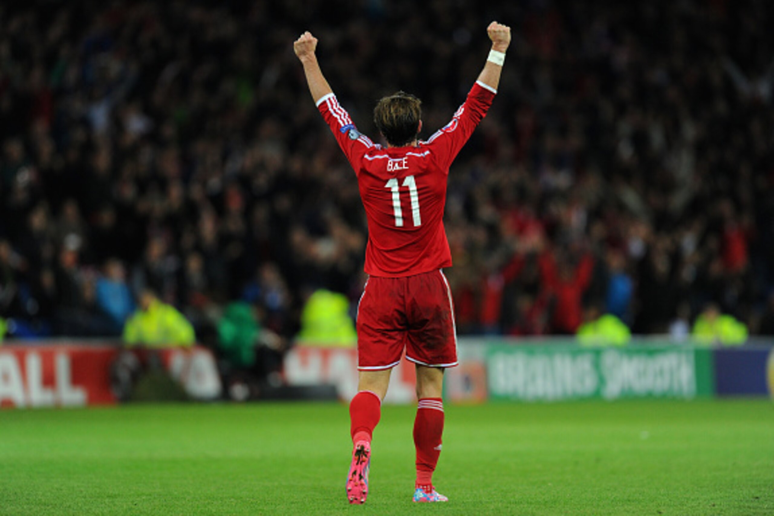 CARDIFF, WALES - OCTOBER 13:  Wales player Gareth Bale celebrates on the final whistle during the EURO 2016 Qualifier match between Wales and Cyprus at Cardiff City Stadium on October 13, 2014 in Cardiff, Wales.  (Photo by Stu Forster/Getty Images)