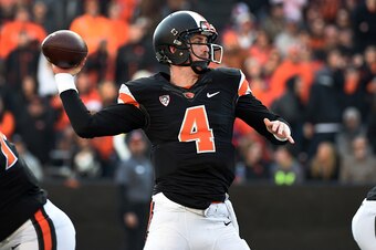 CORVALLIS, OR - NOVEMBER 08: Quarterback Sean Mannion #4 of the Oregon State Beavers passes the ball during the third quarter  of the game against the Washington State Cougars at Reser Stadium on November 8, 2014 in Corvallis, Oregon. (Photo by Steve Dyke