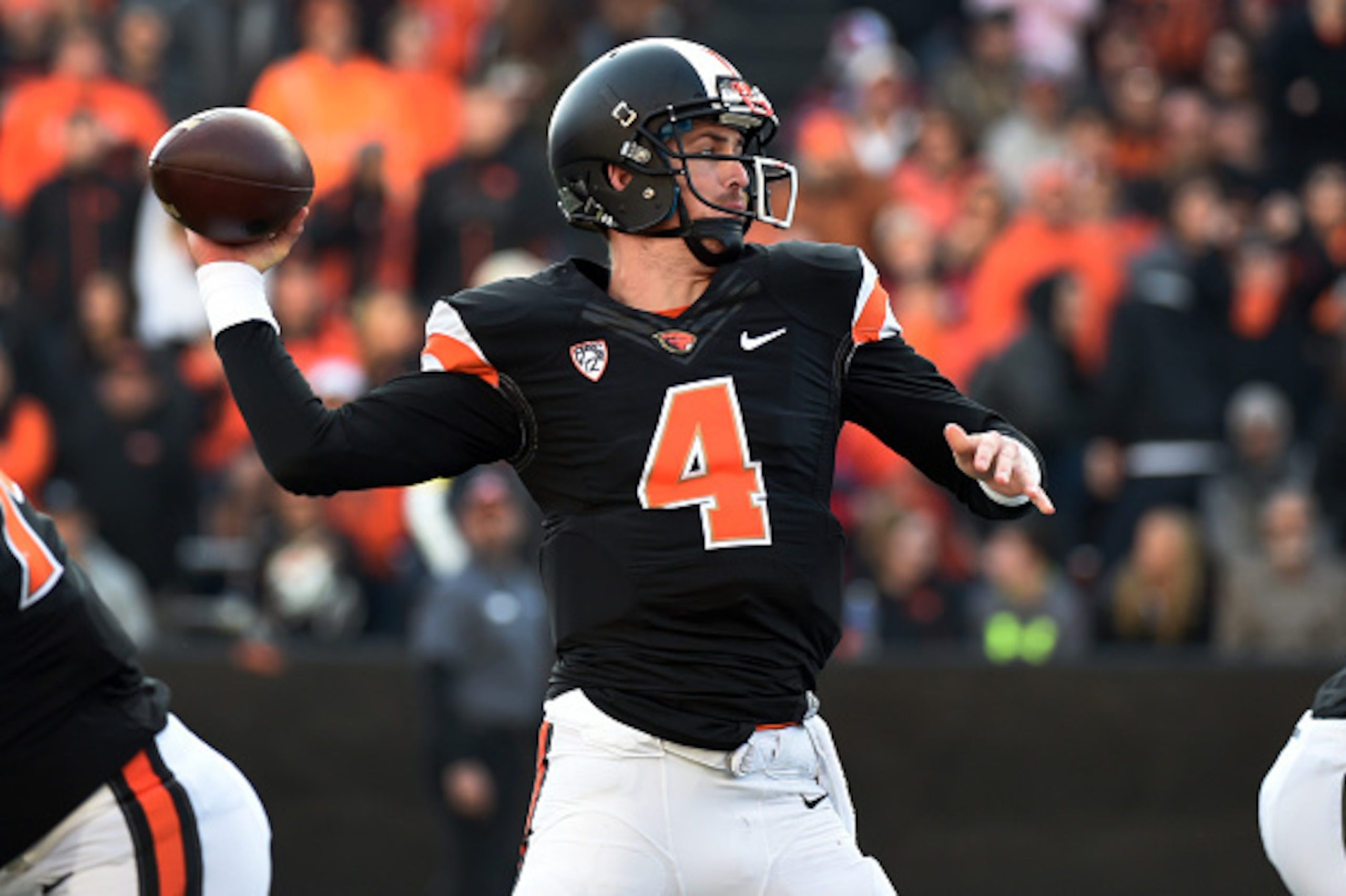 CORVALLIS, OR - NOVEMBER 08: Quarterback Sean Mannion #4 of the Oregon State Beavers passes the ball during the third quarter  of the game against the Washington State Cougars at Reser Stadium on November 8, 2014 in Corvallis, Oregon. (Photo by Steve Dyke