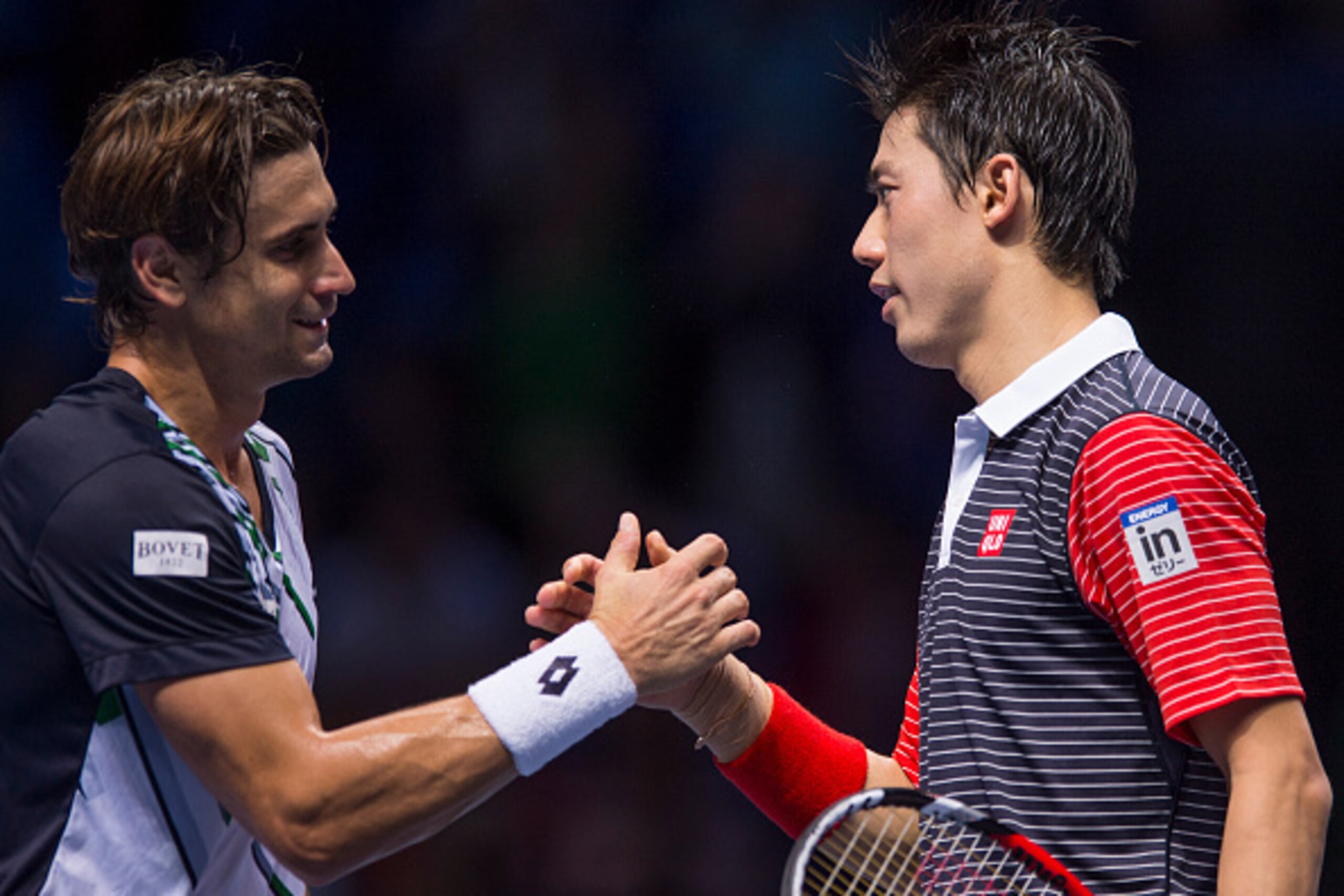 LONDON, ENGLAND - NOVEMBER 13:  Kei Nishikori of Japan shakes hands after winning the round robin singles match against David Ferrer of Spain 2-1 on day five of the Barclays ATP World Tour Finals at O2 Arena on November 13, 2014 in London, England.  (Phot