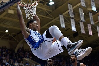 DURHAM, NC - NOVEMBER 04:  Jahlil Okafor #15 of the Duke Blue Devils dunks against the Livingstone College Blue Bears during their game at Cameron Indoor Stadium on November 4, 2014 in Durham, North Carolina. Duke won 115-58.  (Photo by Grant Halverson/Ge