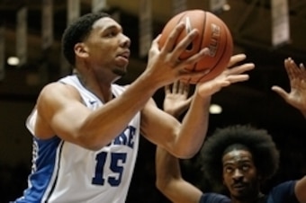 Nov 4, 2014; Durham, NC, USA; Duke Blue Devils center Jahlil Okafor (15) drives past Livingstone Blue Bears forward Shawn Jackson (3) on his way to the basket at Cameron Indoor Stadium. Mandatory Credit: Mark Dolejs-USA TODAY Sports