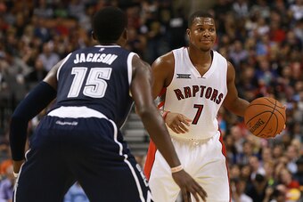 TORONTO, ON - NOVEMBER 4:  Reggie Jackson #15 of the Oklahoma City Thunder defends against Kyle Lowry #7 of the Toronto Raptors during their game at Air Canada Centre on November 4, 2014 in Toronto, Canada. NOTE TO USER: User expressly acknowledges and ag