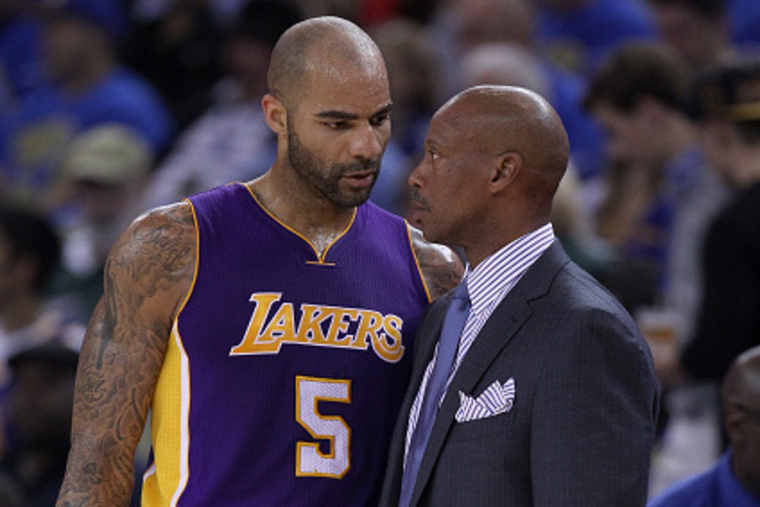 OAKLAND, CA - NOVEMBER 01:  Head coach Byron Scott of the Los Angeles Lakers talks to Carlos Boozer #5 during their game against the Golden State Warriors at ORACLE Arena on November 1, 2014 in Oakland, California. NOTE TO USER: User expressly acknowledge