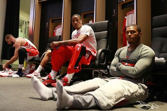 TORONTO,ON - OCTOBER 29:  Jonas Valanciunas #17, DeMar DeRozan #10, and Kyle Lowry #7 of the Toronto Raptors prepare to face the Atlanta Hawks during their NBA game at the Air Canada Centre on October 29, 2014 in Toronto, Ontario, Canada. NOTE TO USER: Us