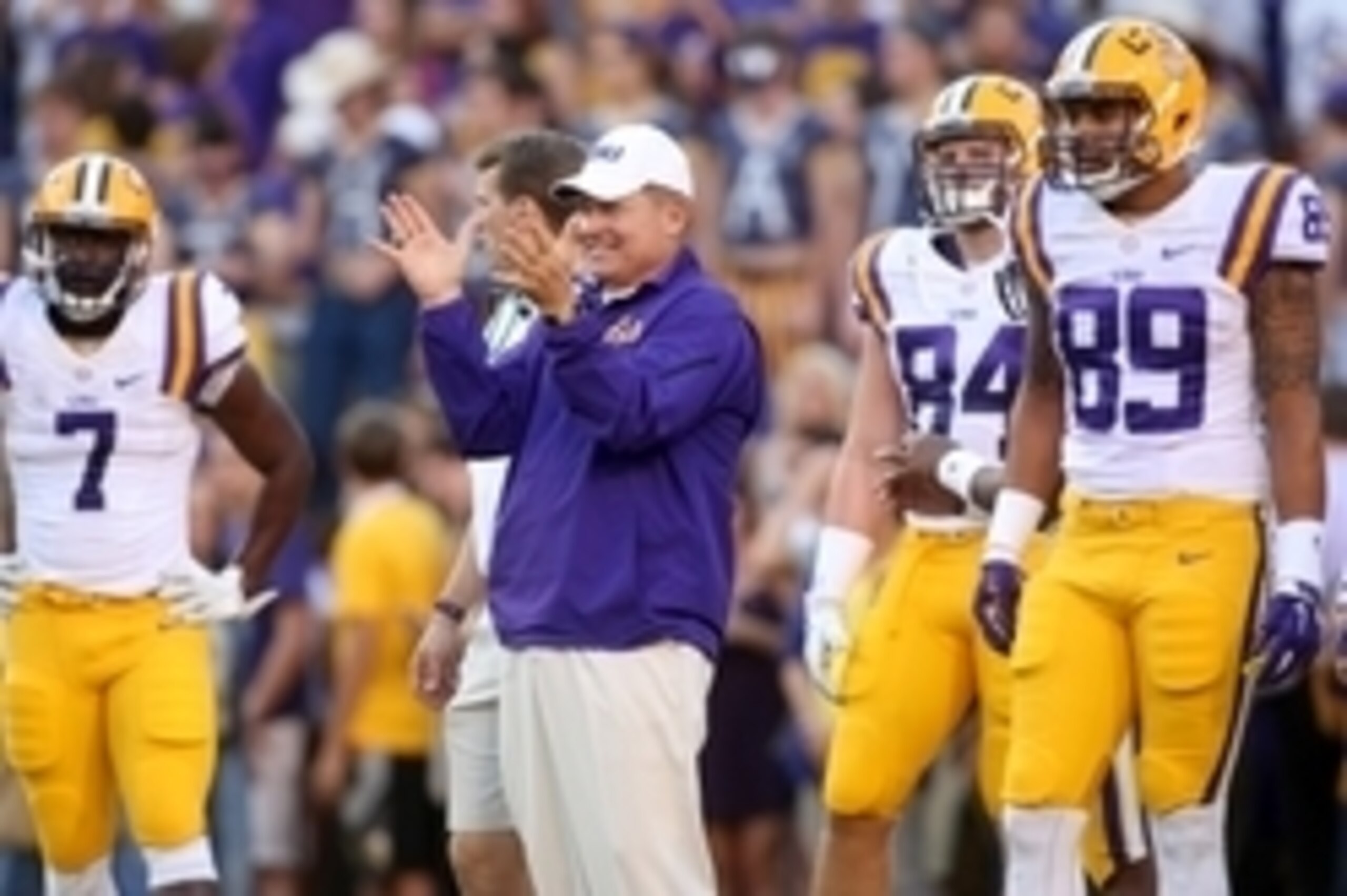 Oct 25, 2014; Baton Rouge, LA, USA; LSU Tigers head coach Les Miles claps for his team during pre game warm ups on the field prior to kickoff against the Mississippi Rebels at Tiger Stadium. LSU defeated Mississippi 10-7. Mandatory Credit: Crystal LoGiudi