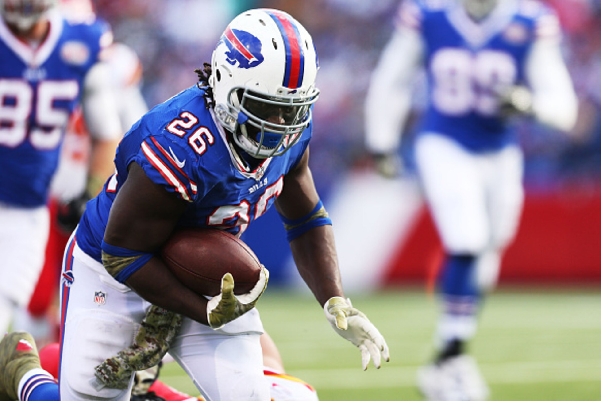 ORCHARD PARK, NY - NOVEMBER 09:   Anthony Dixon #26 of the Buffalo Bills runs the ball during the second half against the Kansas City Chiefs at Ralph Wilson Stadium on November 9, 2014 in Orchard Park, New York.  (Photo by Brett Carlsen/Getty Images)