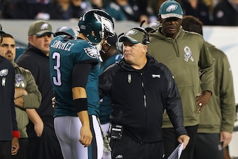 PHILADELPHIA, PA - NOVEMBER 10: Mark Sanchez #3 of the Philadelphia Eagles talks to head coach Chip Kelly after the first drive ended in a field goal attempt against the Carolina Panthers on November 10, 2014 at Lincoln Financial Field in Philadelphia, Pe