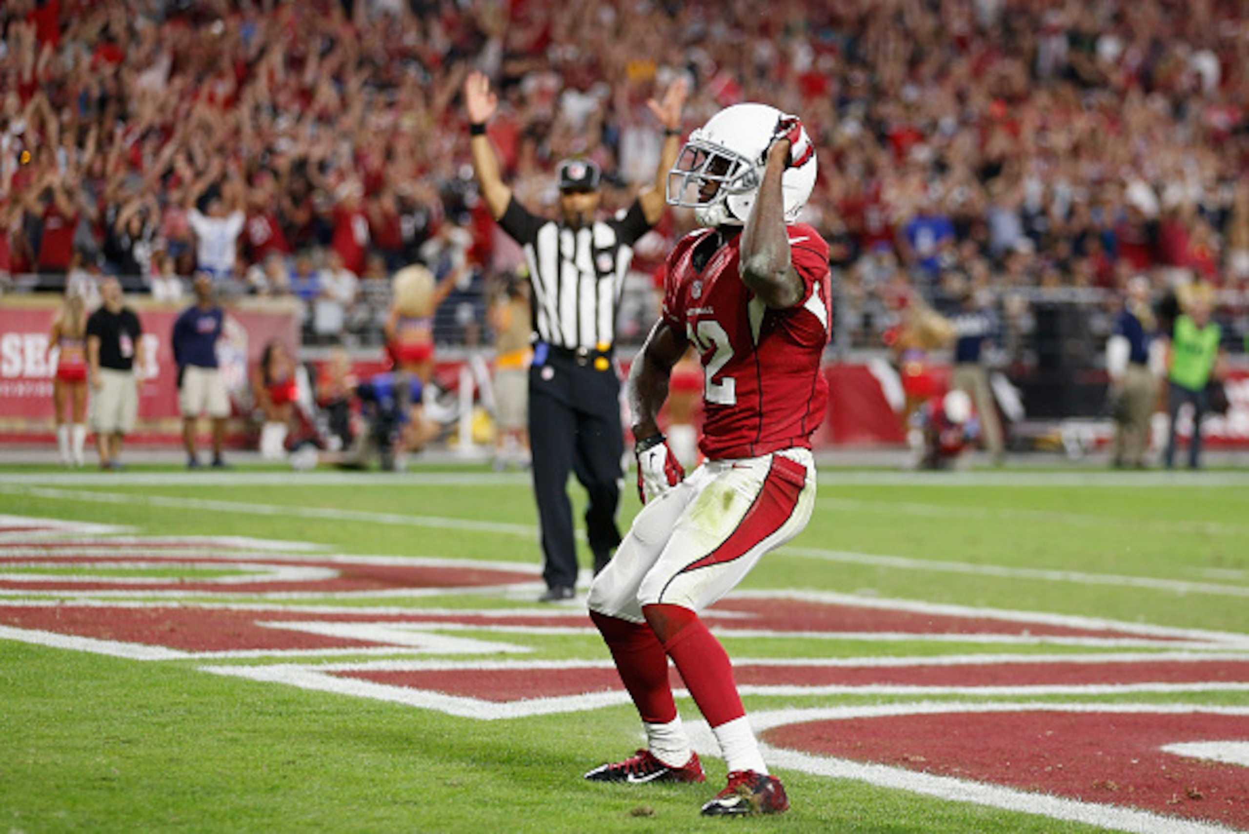 GLENDALE, AZ - NOVEMBER 09:  Wide receiver John Brown #12 of the Arizona Cardinals dances after scoring on a 48-yard touchdown reception against the St. Louis Rams in the fourth quarter at the University of Phoenix Stadium on November 9, 2014 in Glendale,