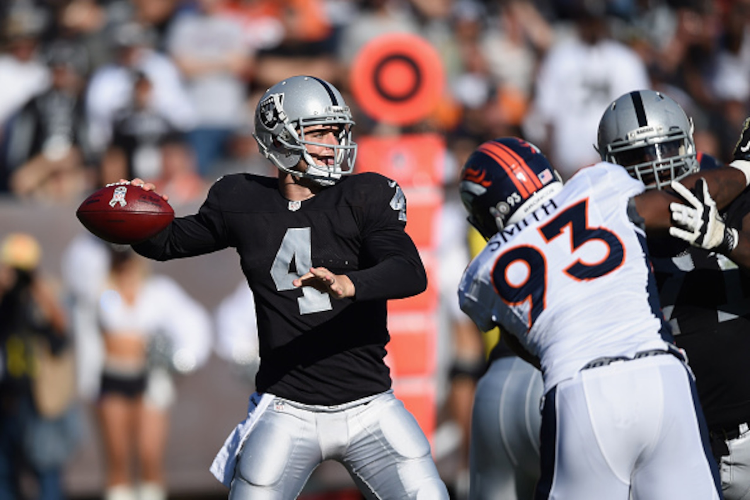 OAKLAND, CA - NOVEMBER 09: Derek Carr #4 of the Oakland Raiders looks downfield against the Denver Broncos at O.co Coliseum on November 9, 2014 in Oakland, California. (Photo by Thearon W. Henderson/Getty Images) OAKLAND, CA - NOVEMBER 09: Derek Carr #4 of the Oakland Raiders looks downfield against the Denver Broncos at O.co Coliseum on November 9, 2014 in Oakland, California. (Photo by Thearon W. Henderson/Getty Images)