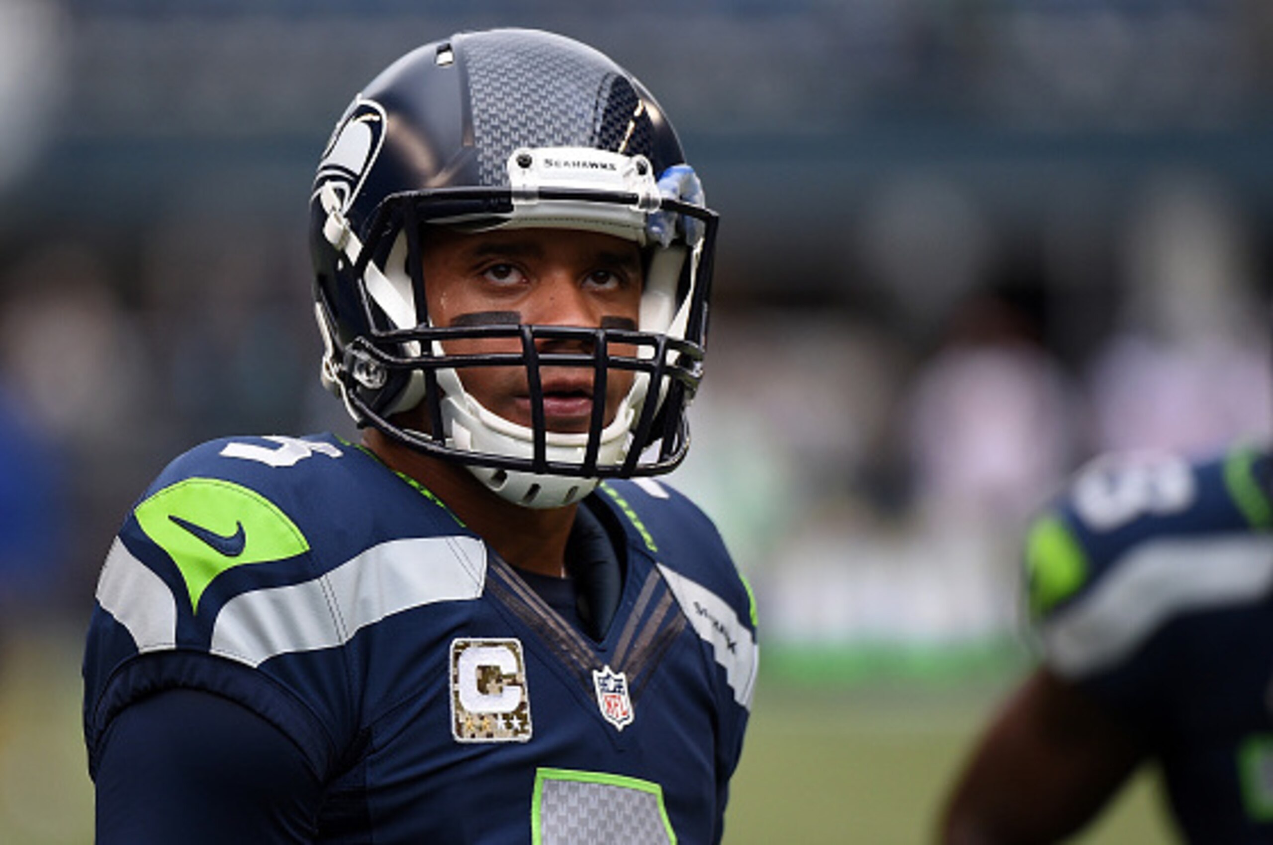 SEATTLE, WA - NOVEMBER 09: Quarterback Russell Wilson #3 of the Seattle Seahawks warms up before the game against the New York Giants at CenturyLink Field on November 9, 2014 in Seattle, Washington. (Photo by Steve Dykes/Getty Images) SEATTLE, WA - NOVEMBER 09: Quarterback Russell Wilson #3 of the Seattle Seahawks warms up before the game against the New York Giants at CenturyLink Field on November 9, 2014 in Seattle, Washington. (Photo by Steve Dykes/Getty Images)