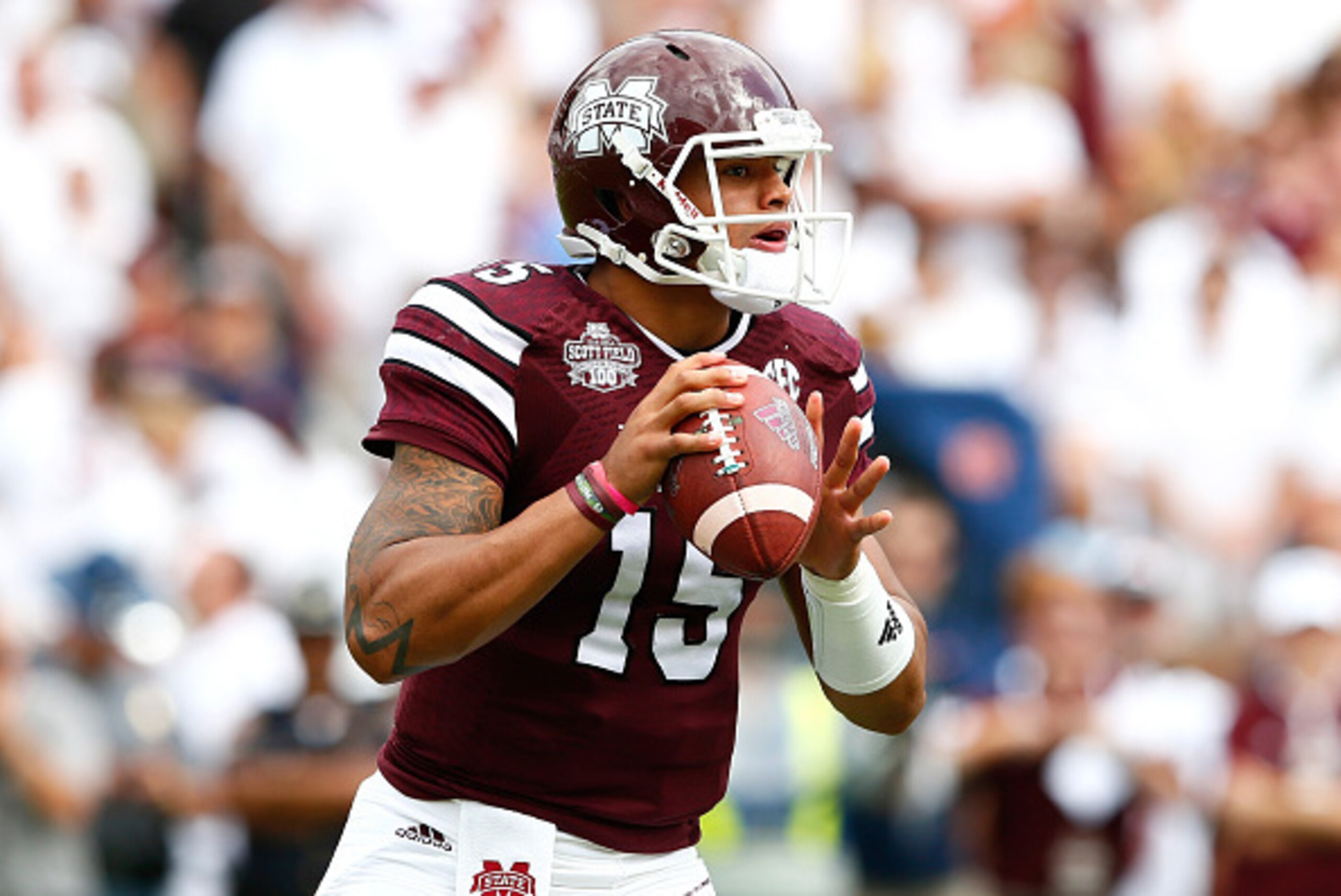 STARKVILLE, MS - OCTOBER 11:  Dak Prescott #15 of the Mississippi State Bulldogs looks to pass against the Auburn Tigers at Davis Wade Stadium on October 11, 2014 in Starkville, Mississippi.  (Photo by Kevin C. Cox/Getty Images)