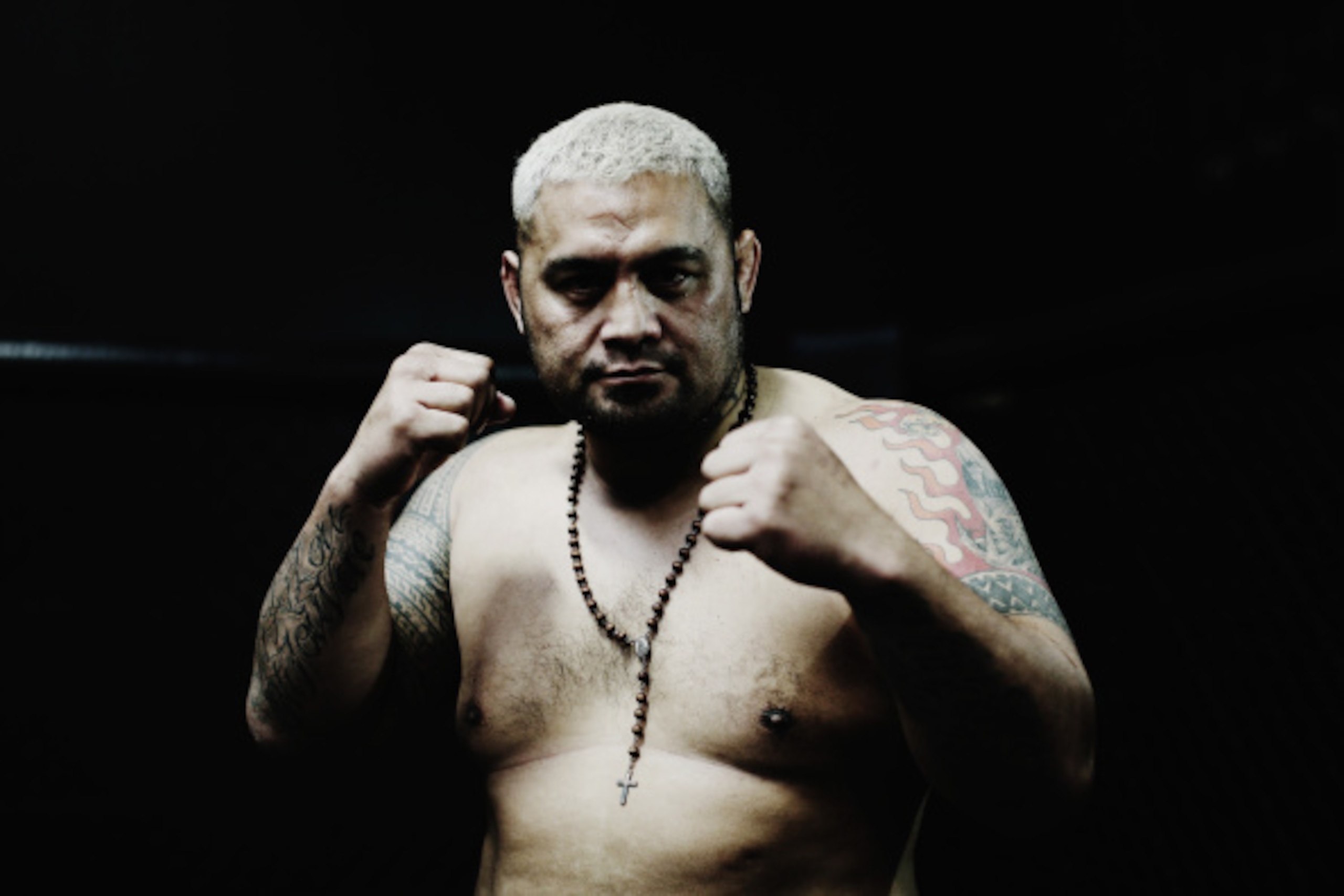 AUCKLAND, NEW ZEALAND - SEPTEMBER 03:  (EDITORS NOTE: This image has been desaturated.) Mark Hunt poses during the UFC Fight Night media session at SKY TV Gym on September 3, 2014 in Auckland, New Zealand.  (Photo by Hannah Peters/Getty Images)