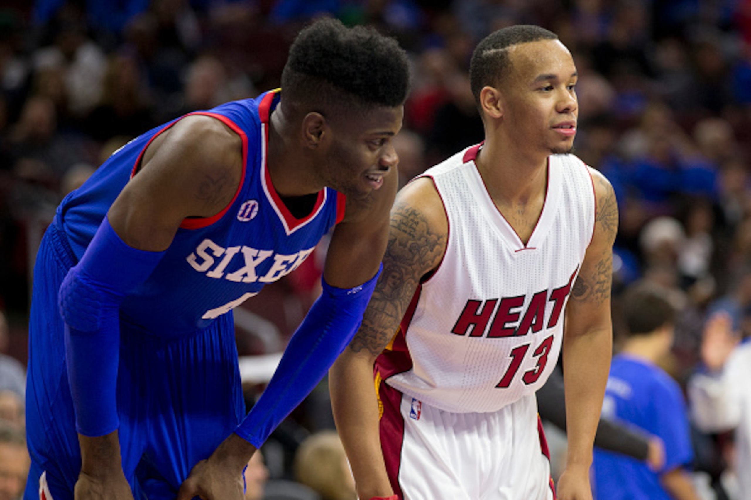 PHILADELPHIA, PA - NOVEMBER 1: Nerlens Noel #1 of the Philadelphia 76ers plays and Shabazz Napier #13 of the Miami heat wait for a foul shot to be taken in the game on November 1, 2014 at the Wells Fargo Center in Philadelphia, Pennsylvania. NOTE TO USER: