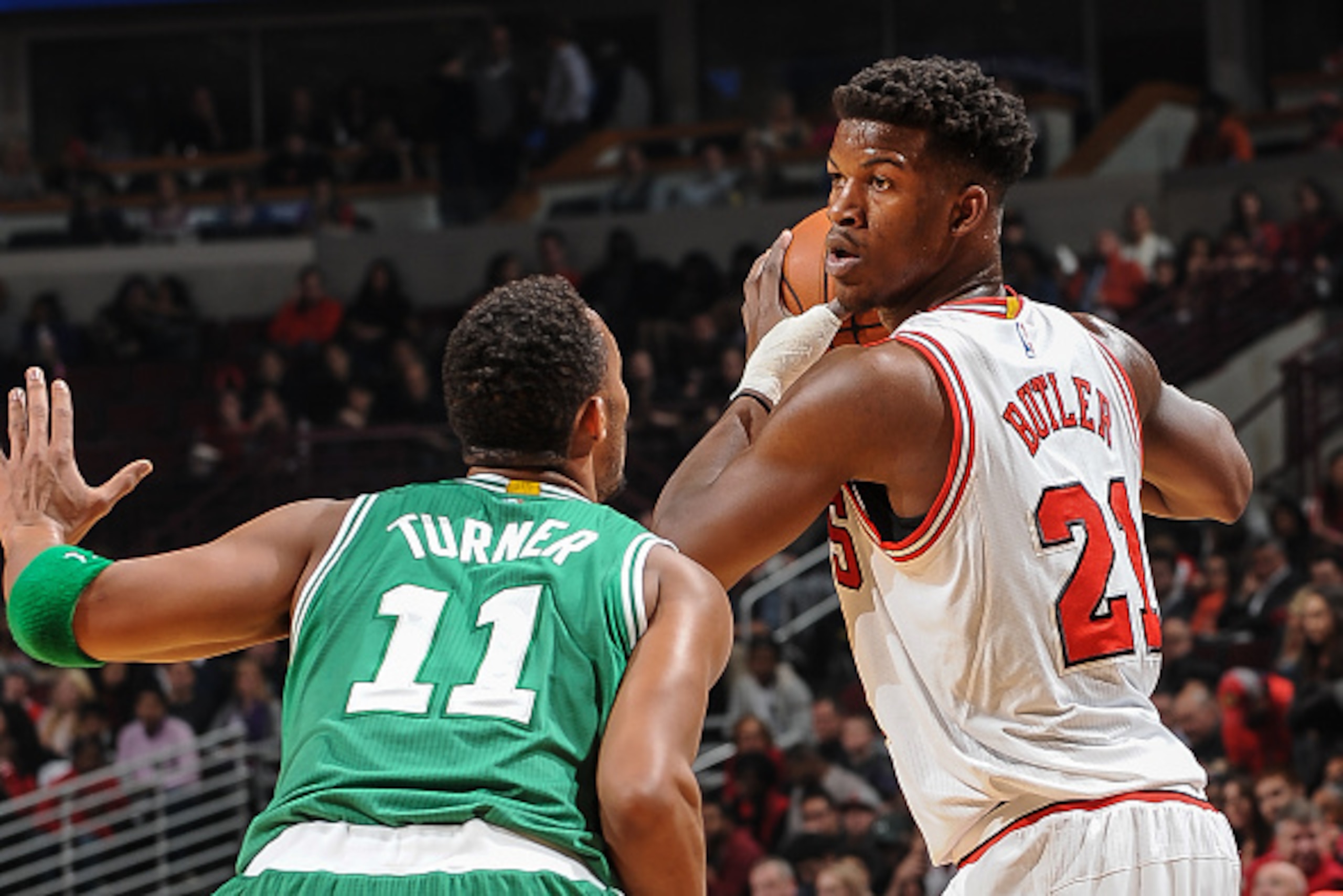 CHICAGO, IL - NOVEMBER 8: Jimmy Butler #21 of the Chicago Bulls handles the ball against the Boston Celtics on November 08, 2014 at the United Center in Chicago, Illinois. NOTE TO USER: User expressly acknowledges and agrees that, by downloading and or us