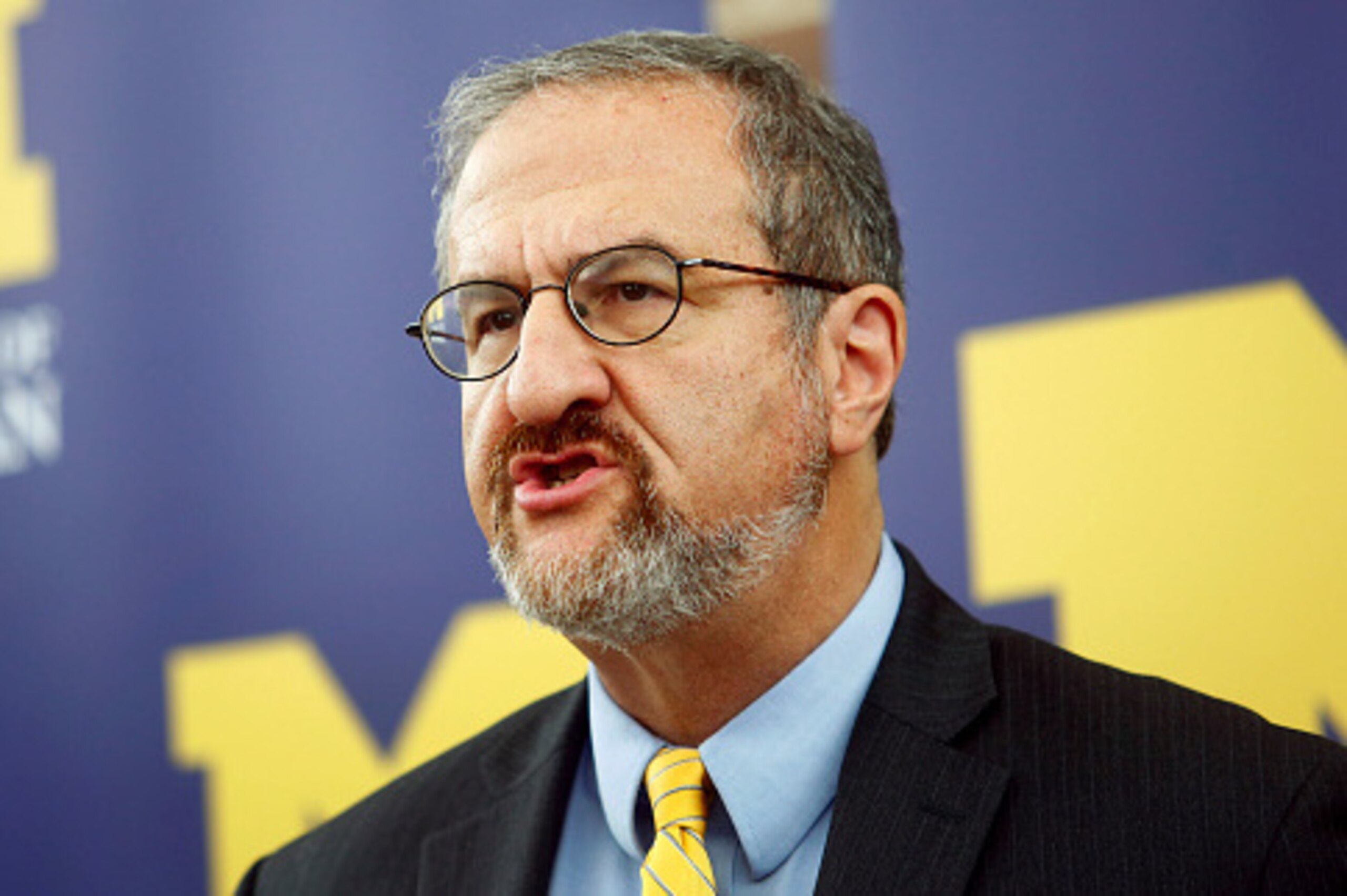 ANN ARBOR, MI - OCTOBER 31 : University of Michigan President Mark Schlissel speaks at a news conference announcing the resignation of Michigan Athletic Director Dave Brandon in the Regents Room of the Fleming Administration Building October 31, 2014 in A