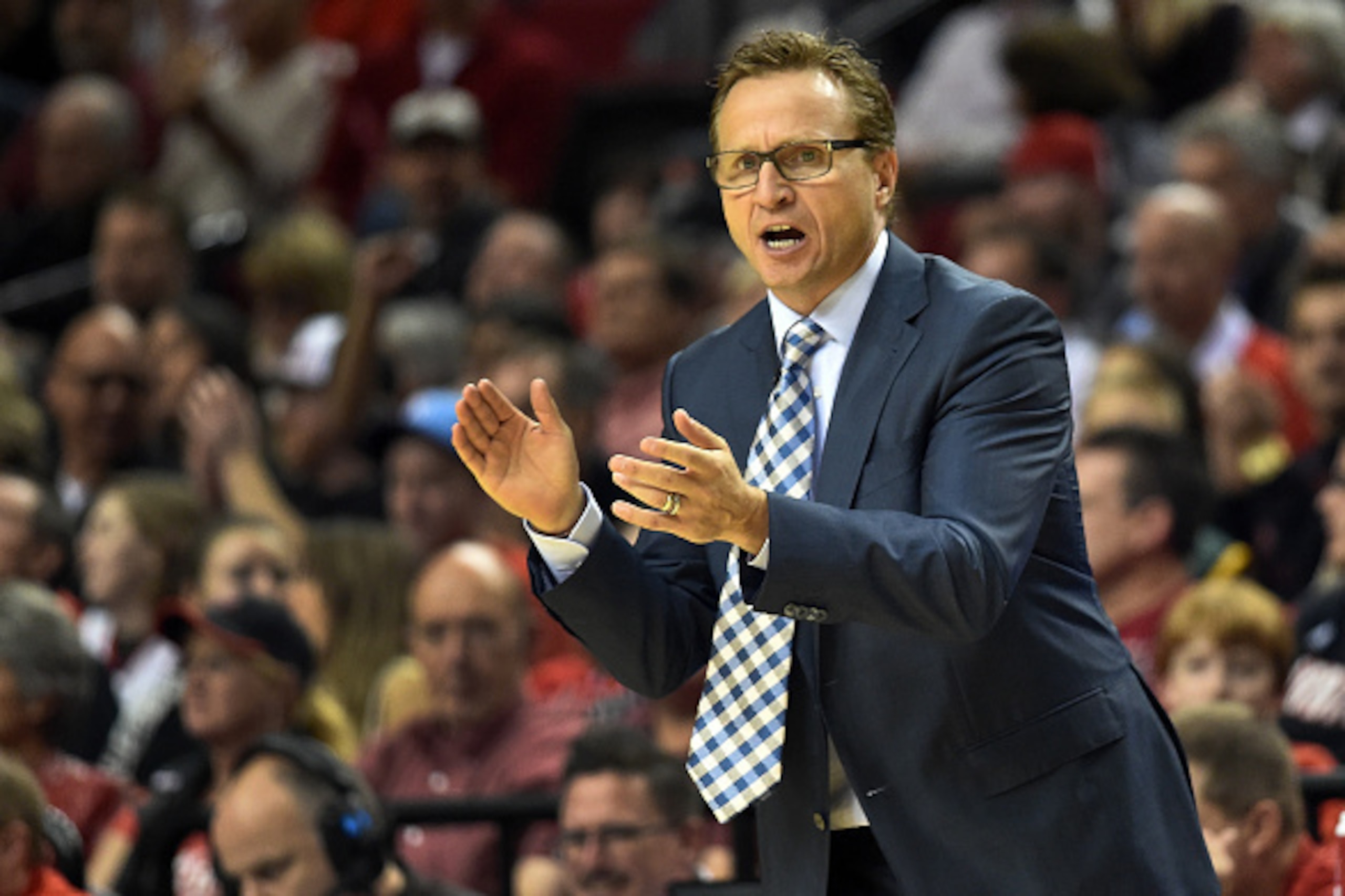 PORTLAND, OR - OCTOBER 29: Scott Brooks of the Oklahoma City Thunder  signals to his team in the second quarter of the game against the Portland Trail Blazers at Moda Center on October 29, 2014 in Portland, Oregon.  NOTE TO USER: User expressly ackowledge