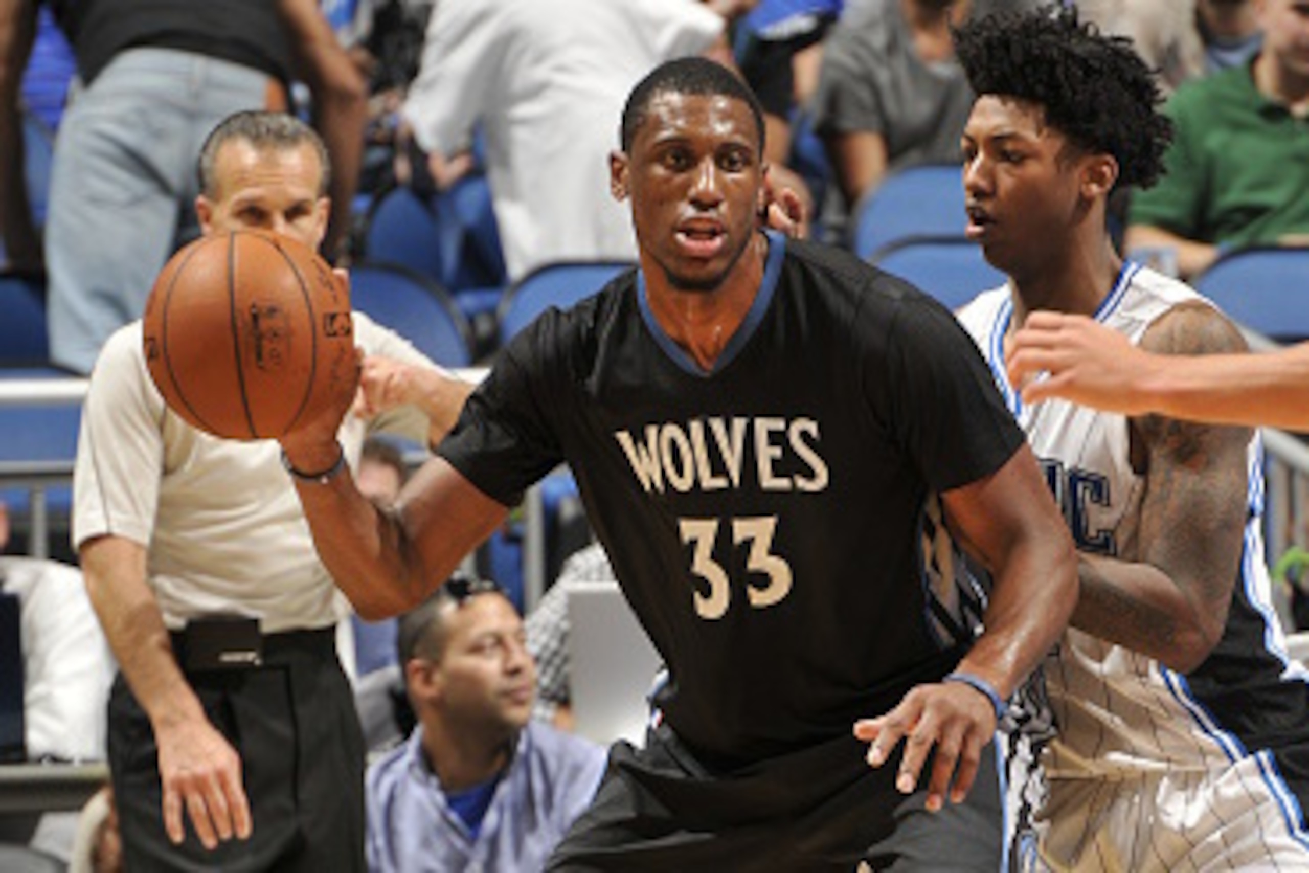 ORLANDO, FL - NOVEMBER 7: Thaddeus Young #33 of the Minnesota Timberwolves handles the ball against the Orlando Magic on November 7, 2014 at Amway Center in Orlando, Florida. NOTE TO USER: User expressly acknowledges and agrees that, by downloading and or