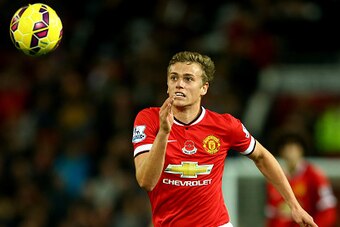 MANCHESTER, ENGLAND - NOVEMBER 08:  James Wilson of Manchester United in action during the Barclays Premier League match between Manchester United and Crystal Palace at Old Trafford on November 8, 2014 in Manchester, England.  (Photo by Richard Heathcote/