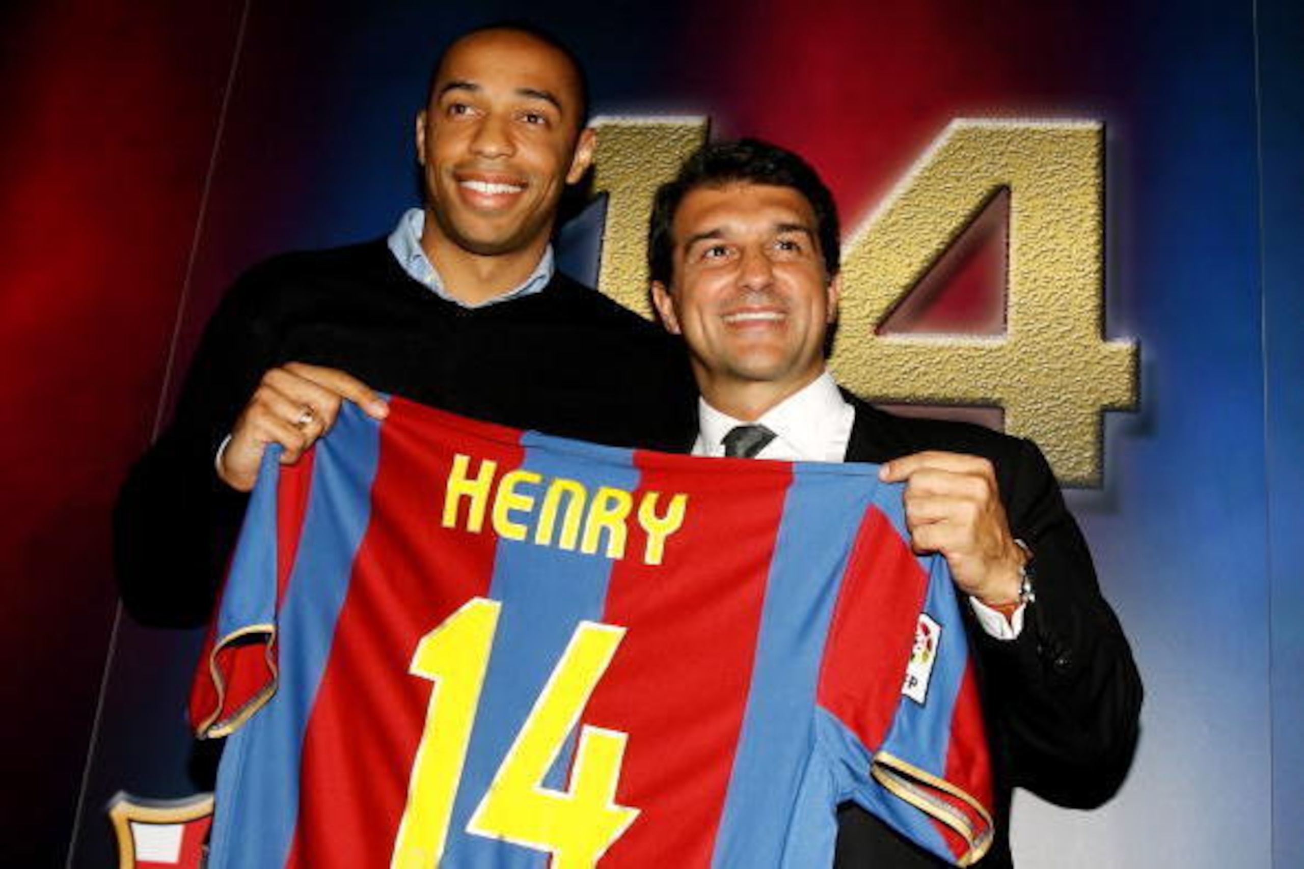BARCELONA, SPAIN - JUNE 25:  Former Arsenal forward Thierry Henry (L) poses with his new shirt and Barcelona President Joan Laporta after a press conference at the Nou Camp on June 25, 2007 in Barcelona, Spain.  (Photo by Shaun Botterill/Getty Images)