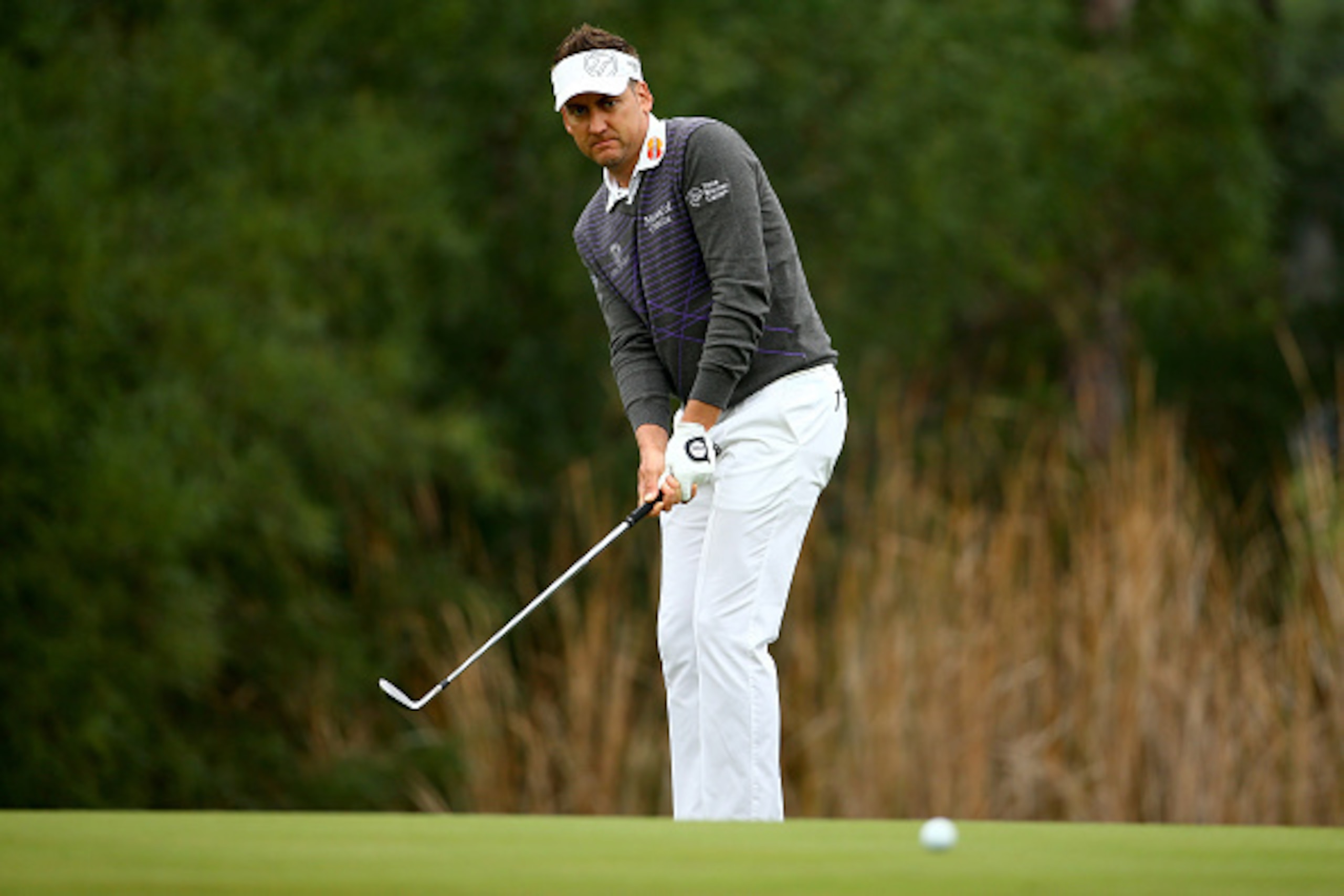 ANTALYA, TURKEY - NOVEMBER 14:  Ian Poulter of England chips to the 5th green during the second round of the 2014 Turkish Airlines Open at The Montgomerie Maxx Royal on November 14, 2014 in Antalya, Turkey.  (Photo by Richard Heathcote/Getty Images)
