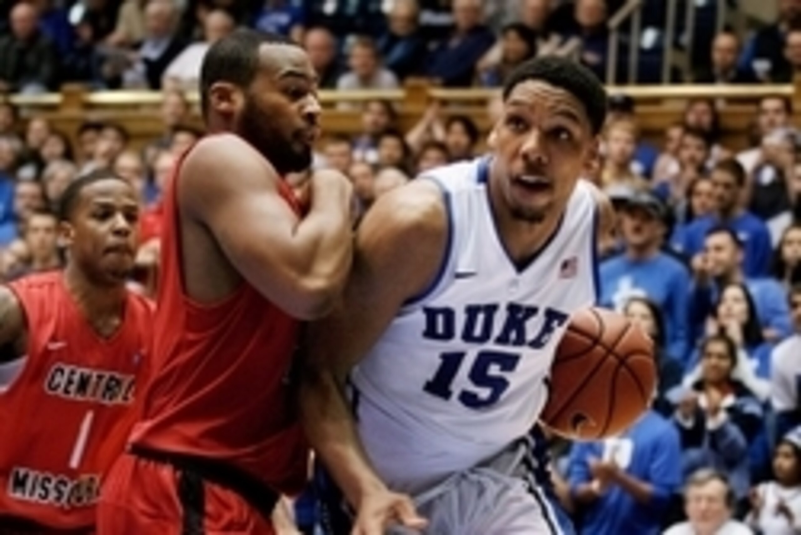 Nov 8, 2014; Durham, NC, USA; Duke Blue Devils center Jahlil Okafor (15) drives against Central Missouri Mules forward Brennen Hughes (10) in their game at Cameron Indoor Stadium. Mandatory Credit: Mark Dolejs-USA TODAY Sports